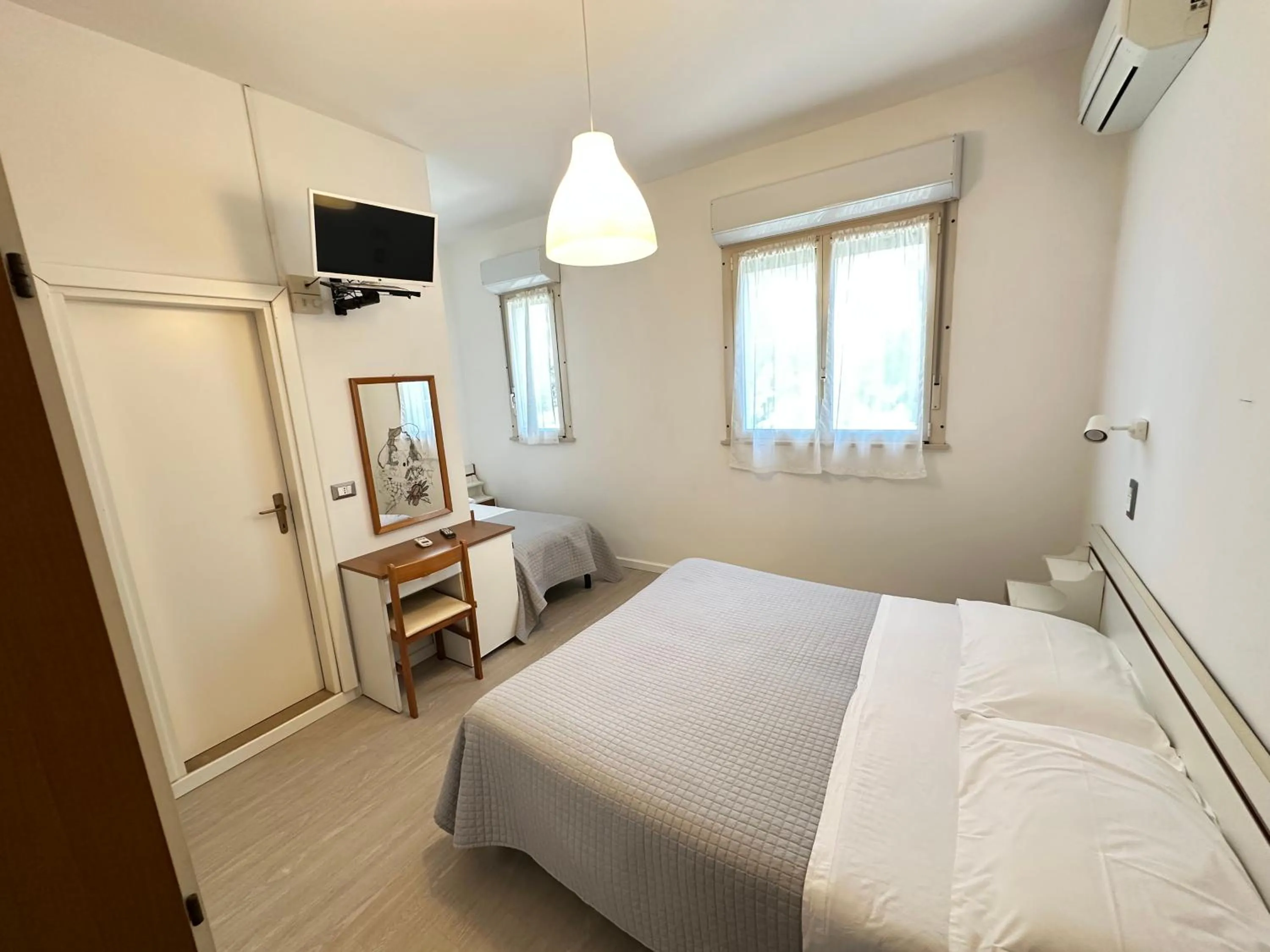 Bed in Hotel Fiorenza