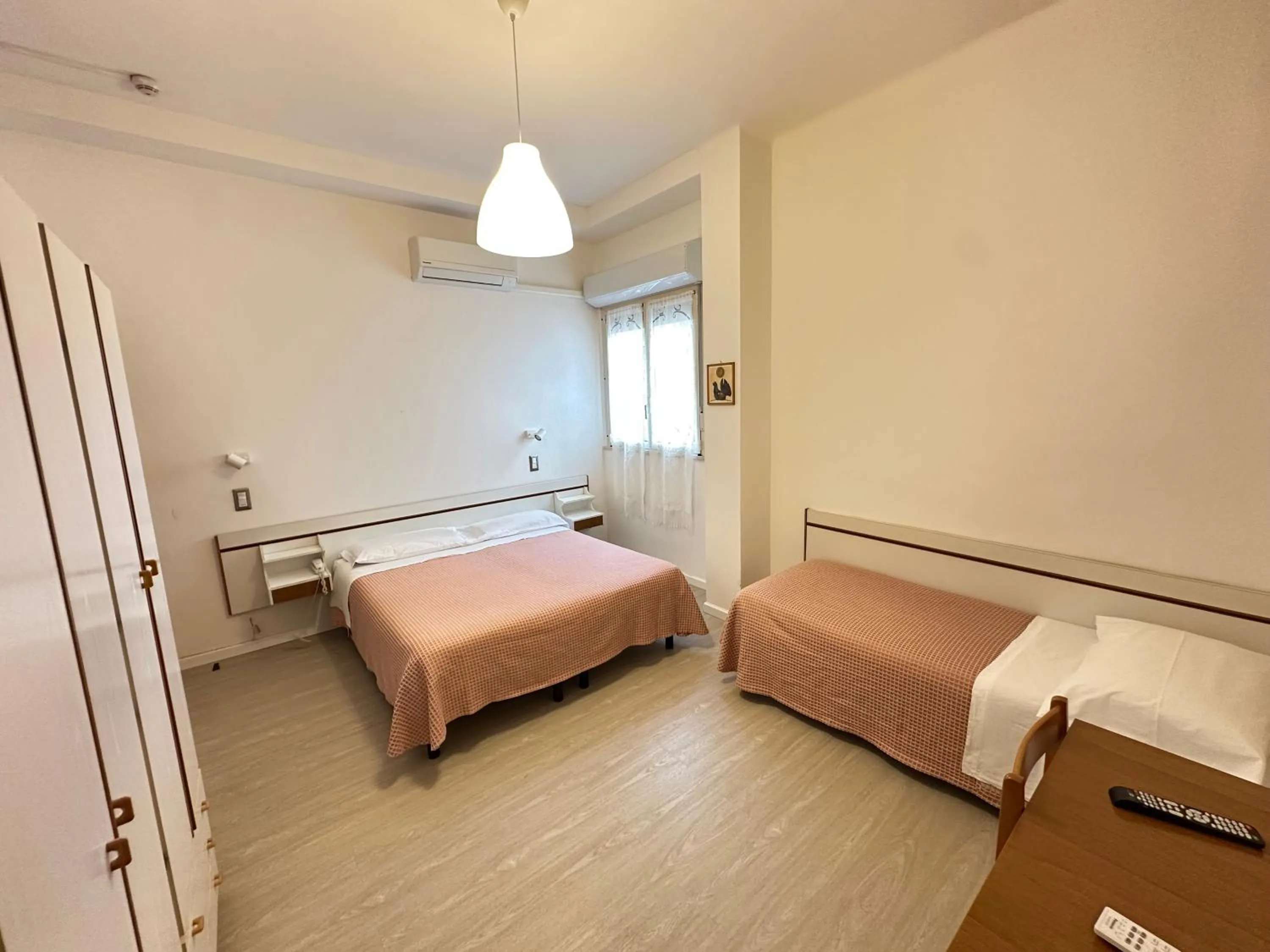 Bed in Hotel Fiorenza