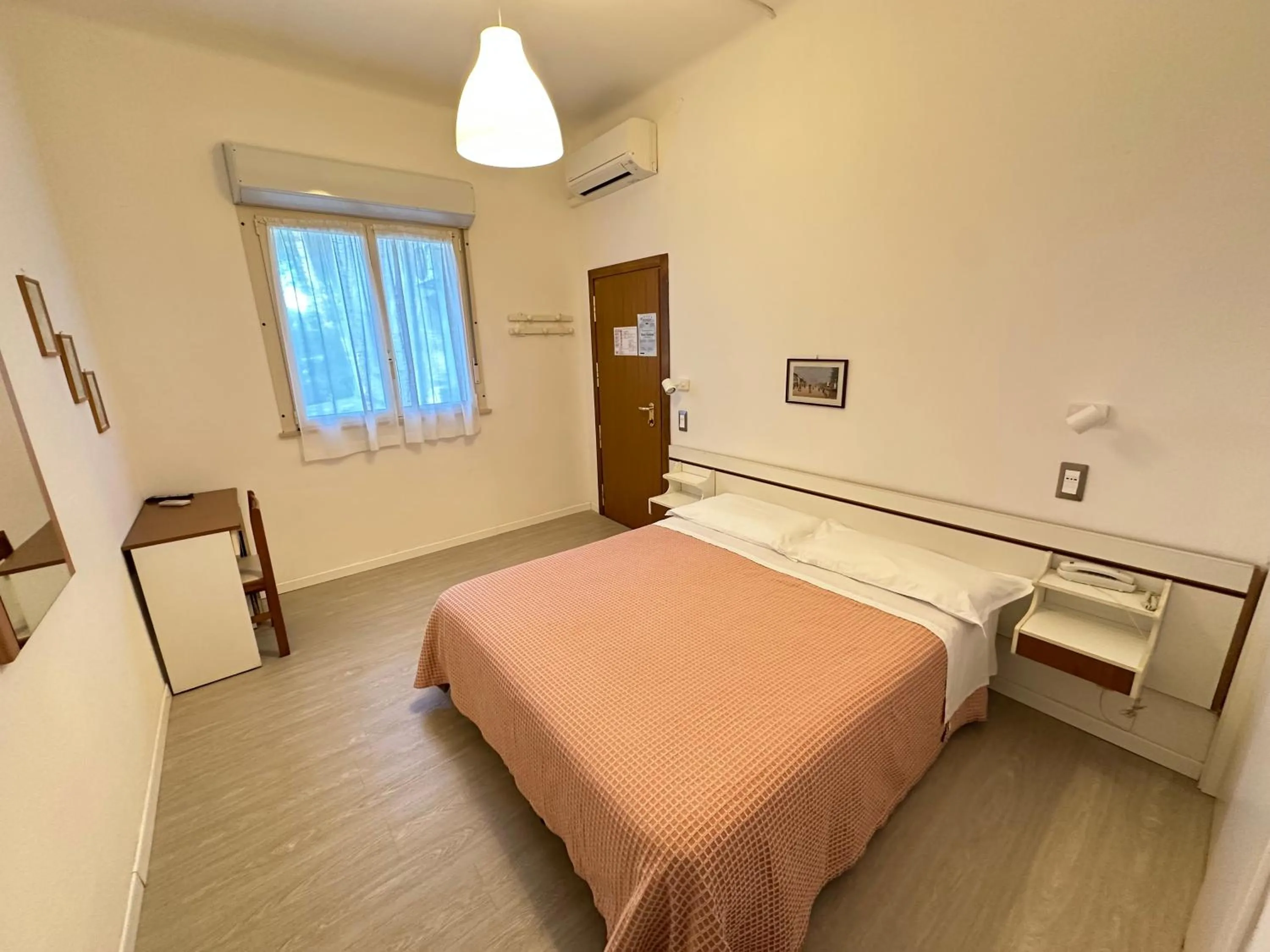 Bed in Hotel Fiorenza