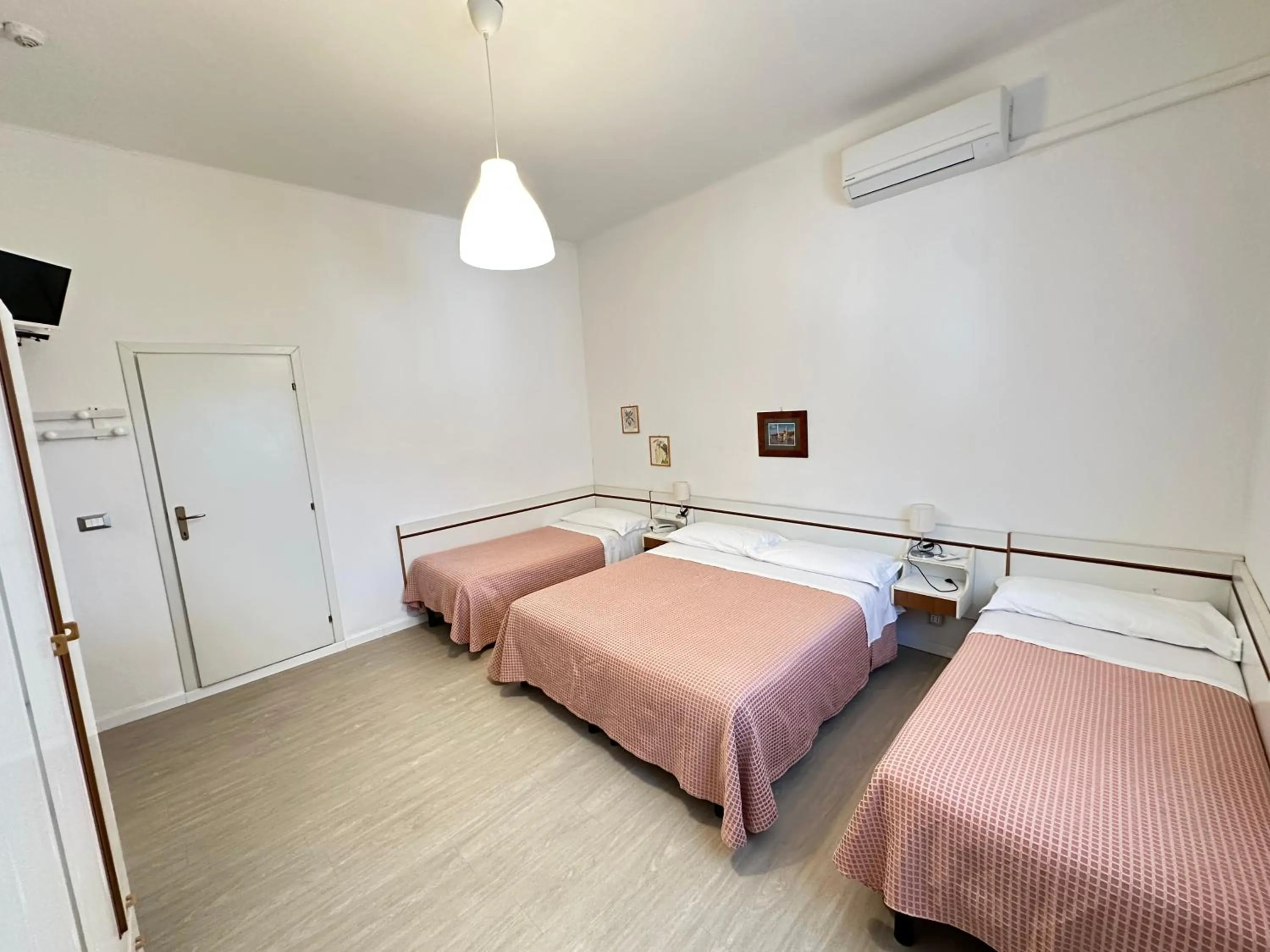 Bed in Hotel Fiorenza