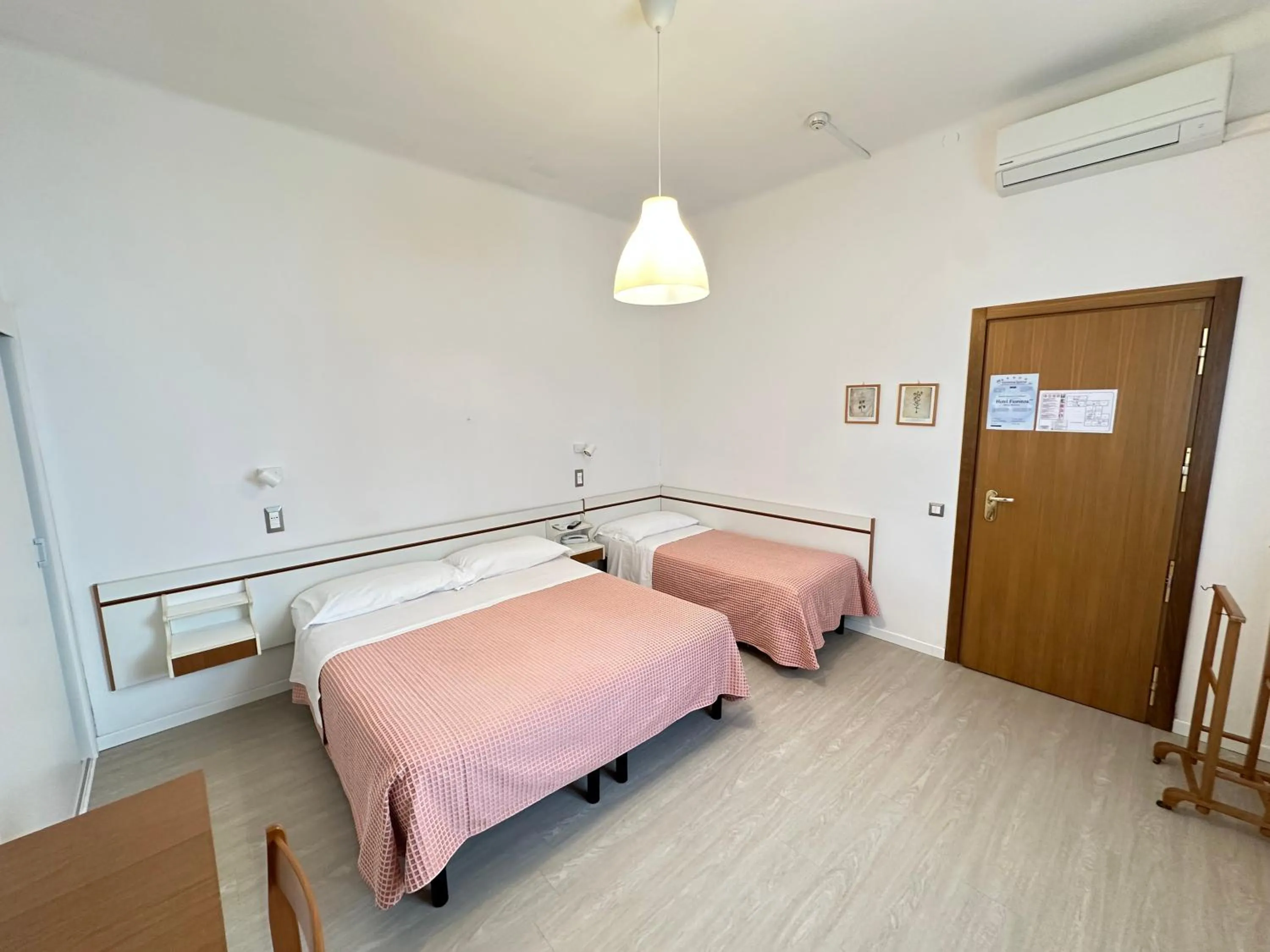 Bed in Hotel Fiorenza