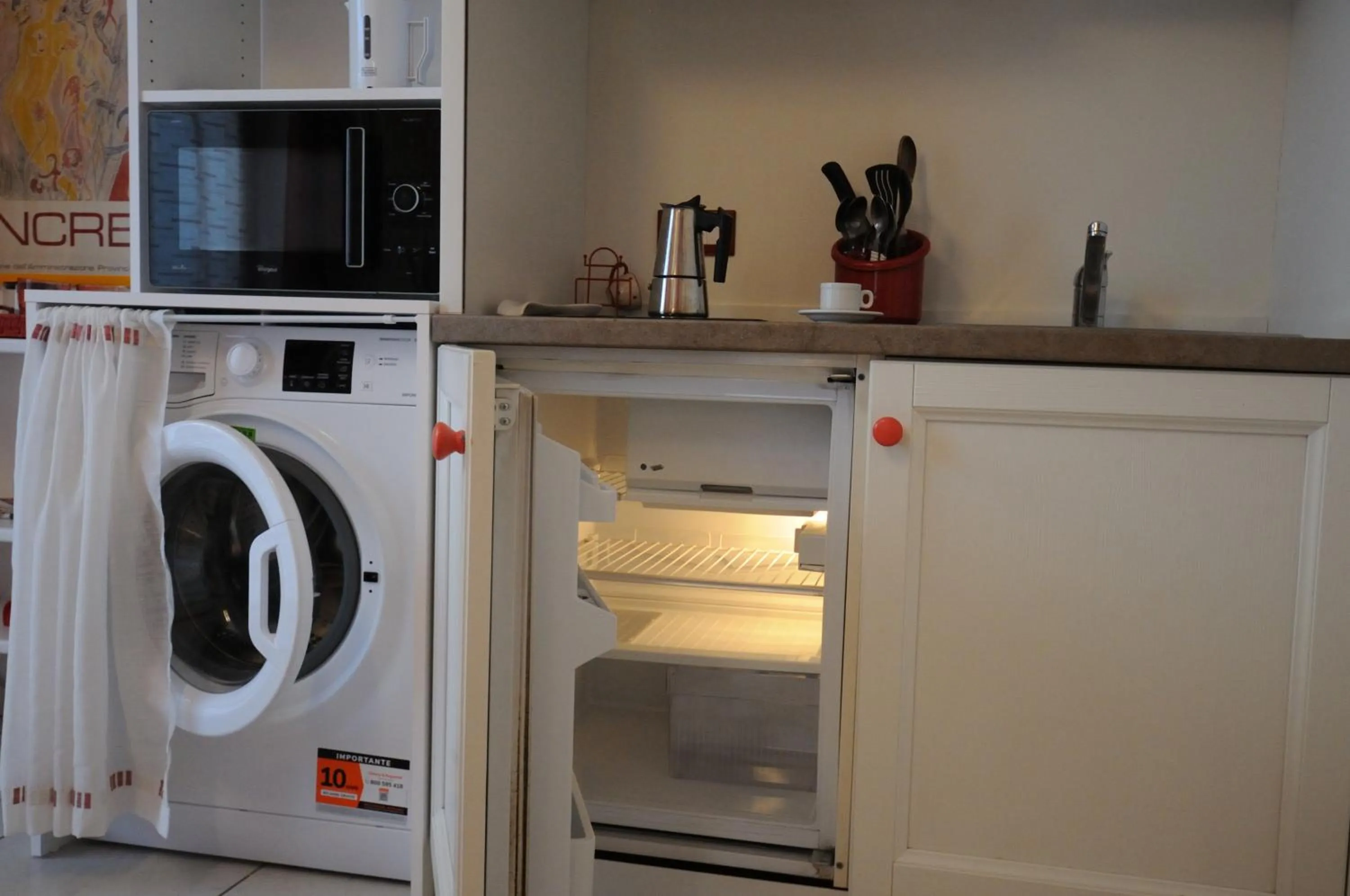 Kitchen or kitchenette in Casa Novecento "Rooms & apartments"