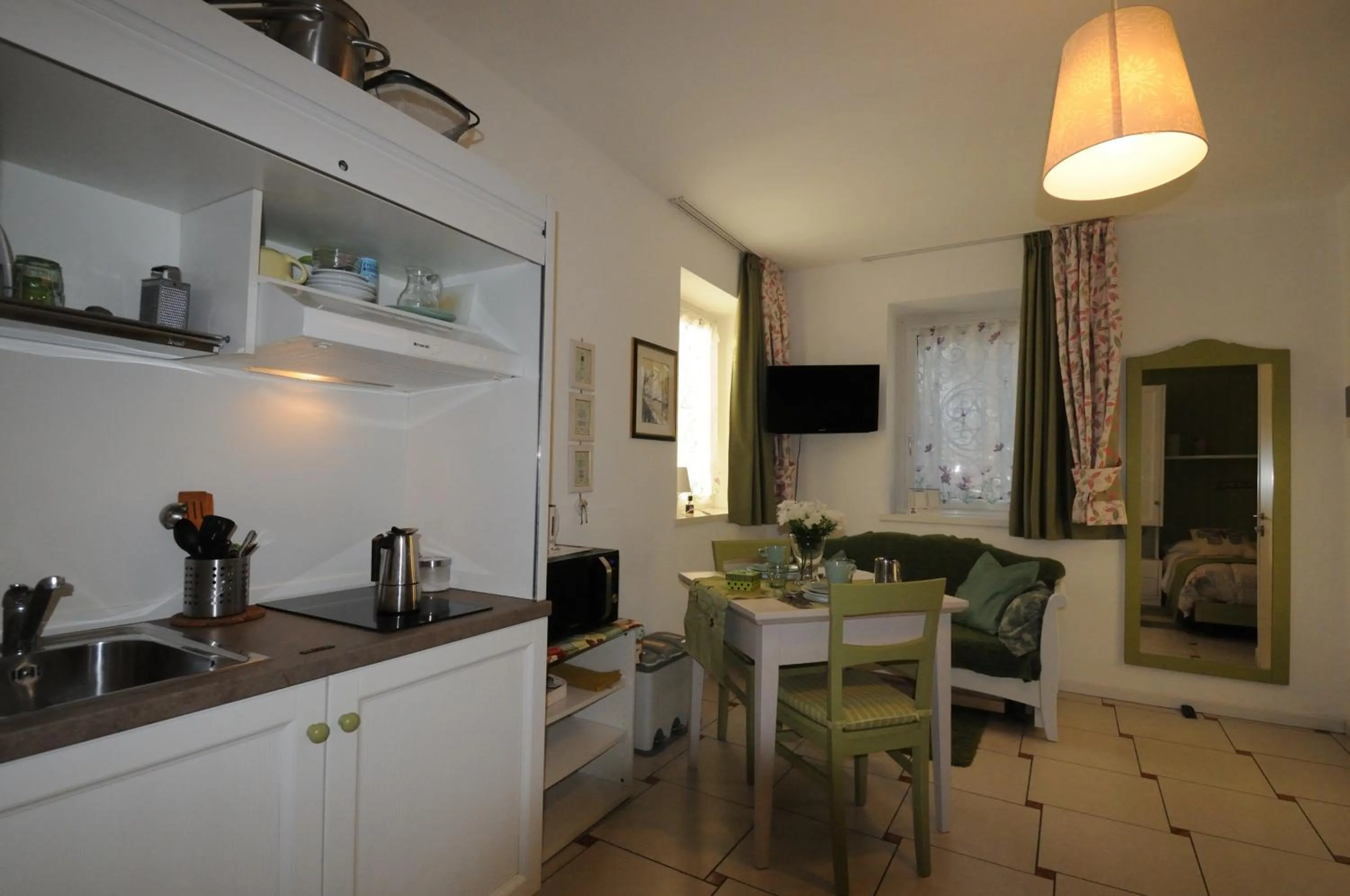 Kitchen or kitchenette in Casa Novecento "Rooms & apartments"