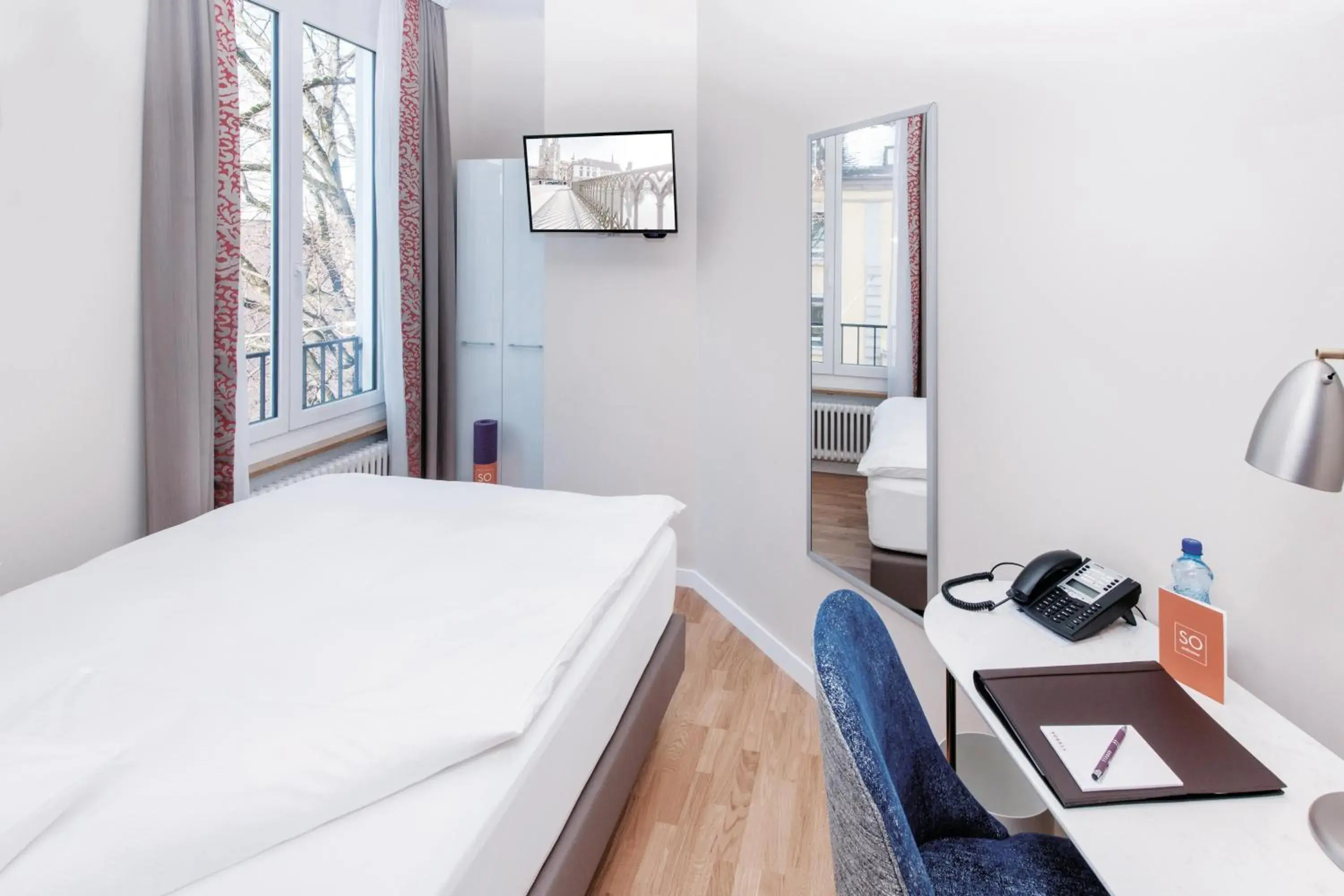 Photo of the whole room, Bed in Sorell Hotel Rex Zürich Photo of the whole room, Bed in Sorell Hotel Rex Zürich