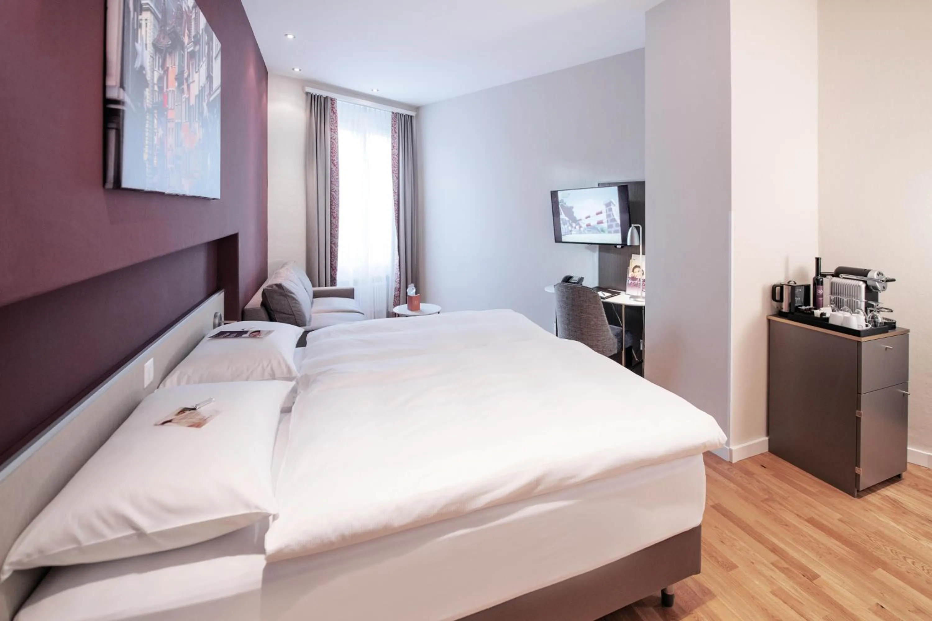 Bed in Sorell Hotel Rex Zürich