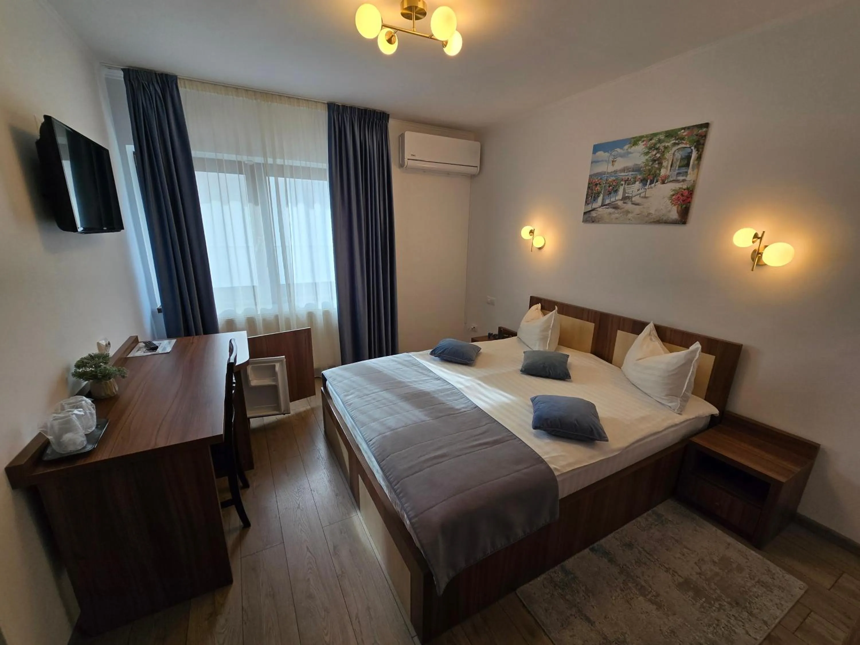 Bed in Pensiunea Transilvania