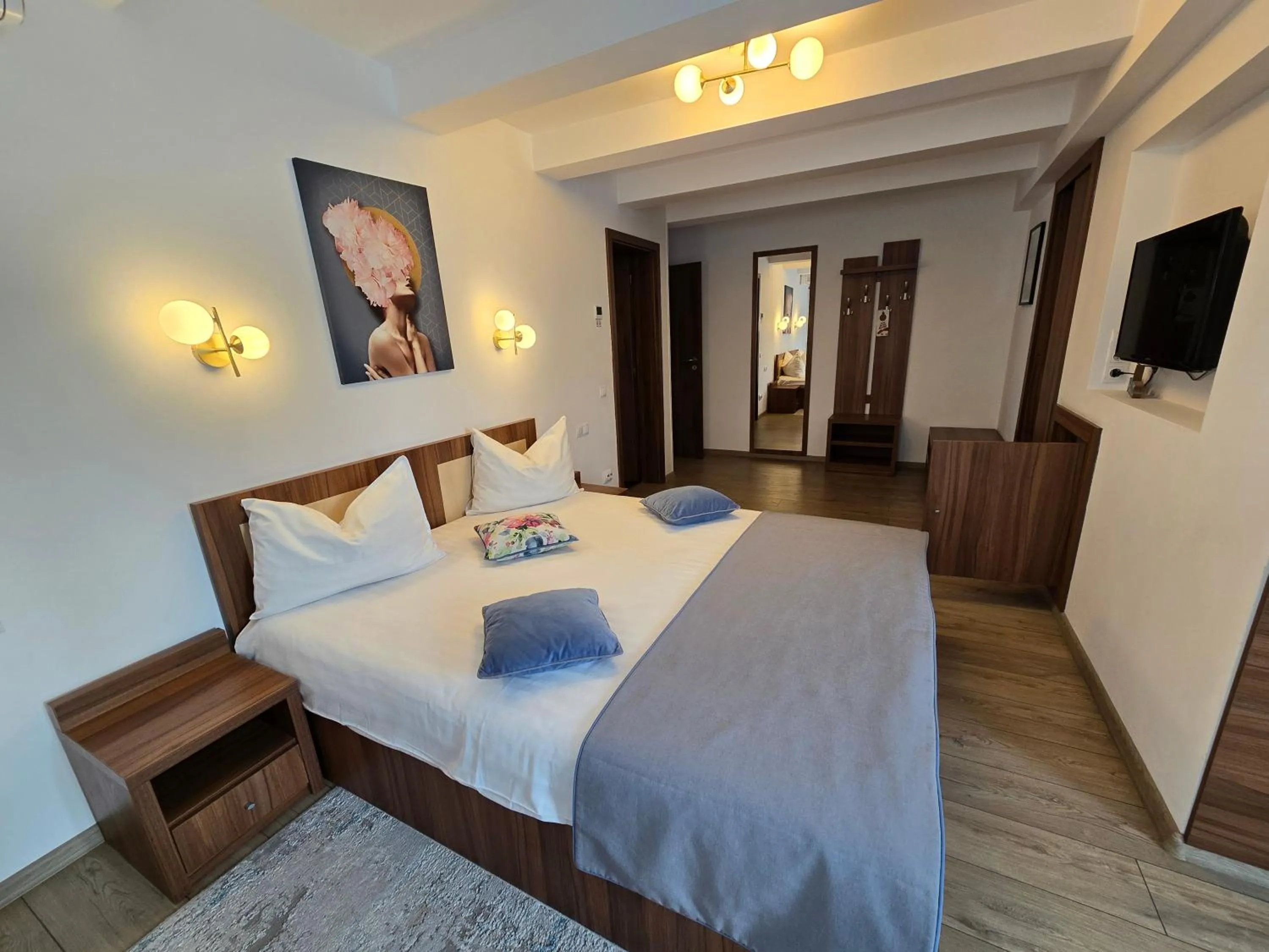 Bed in Pensiunea Transilvania