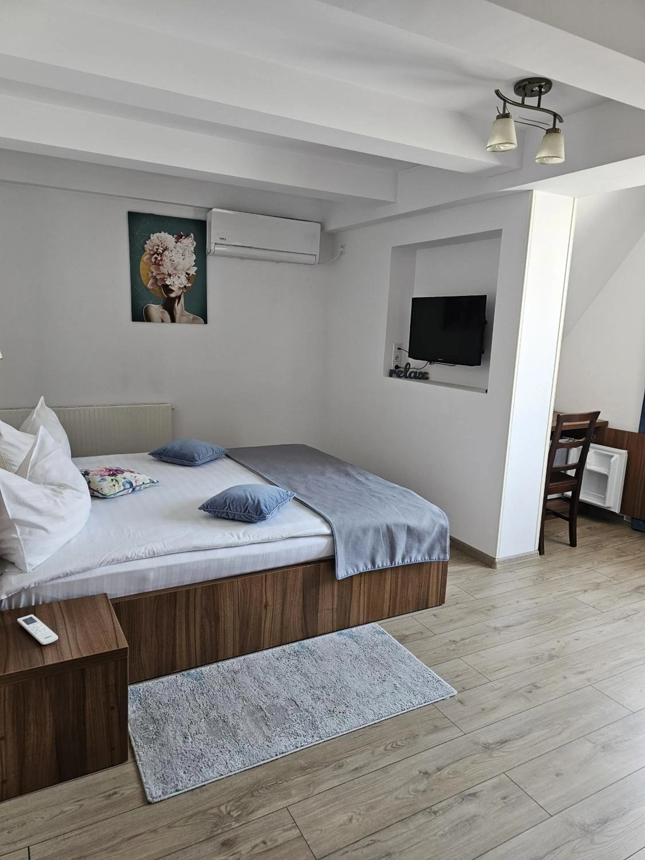 Bed in Pensiunea Transilvania