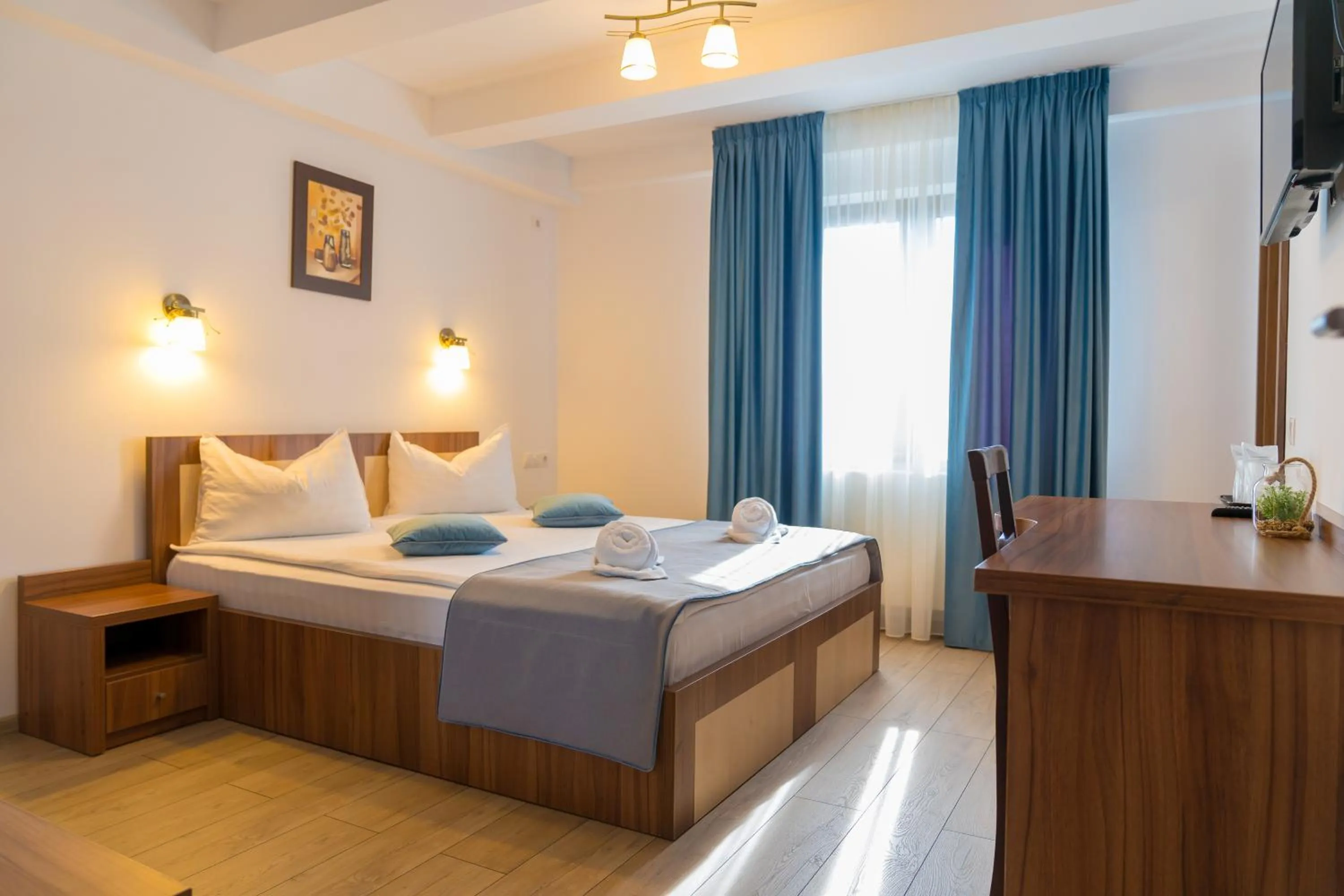 Bed in Pensiunea Transilvania