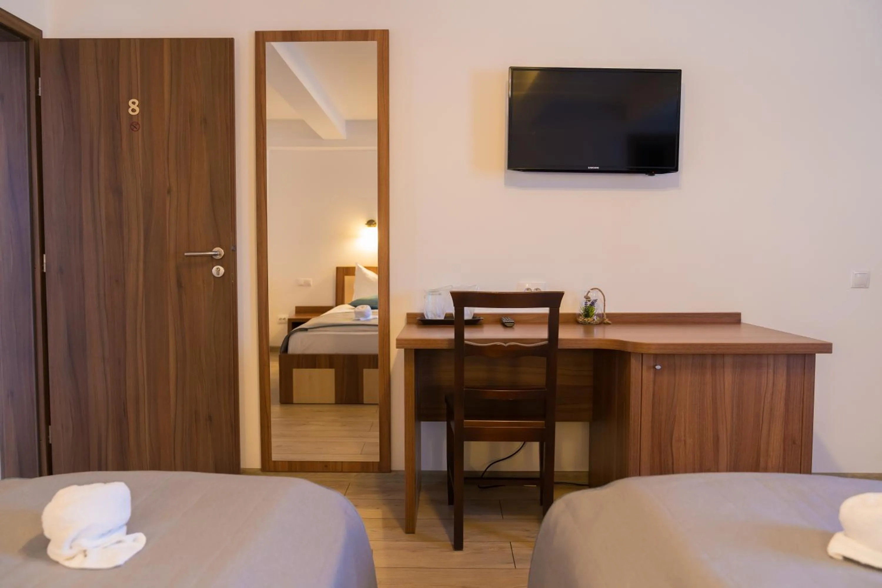 Bed in Pensiunea Transilvania