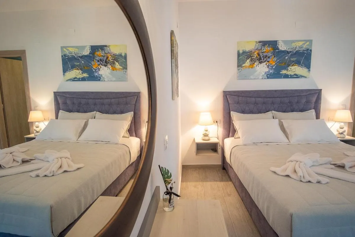 Bed in Serenity Luxe Suites