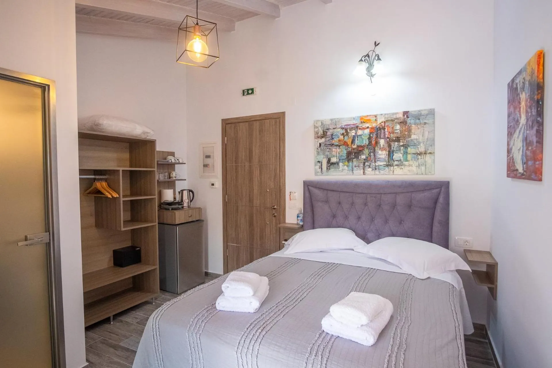 Bed in Serenity Luxe Suites