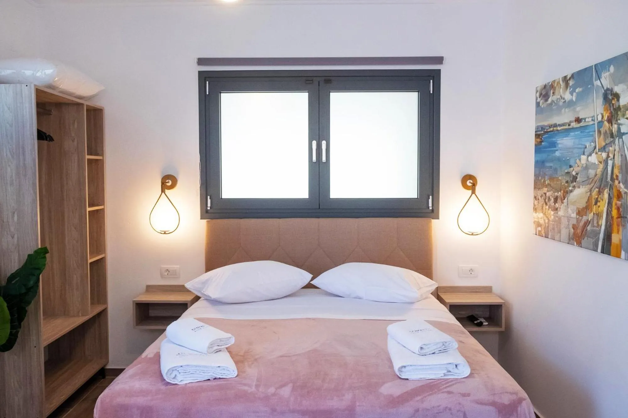 Bed in Serenity Luxe Suites