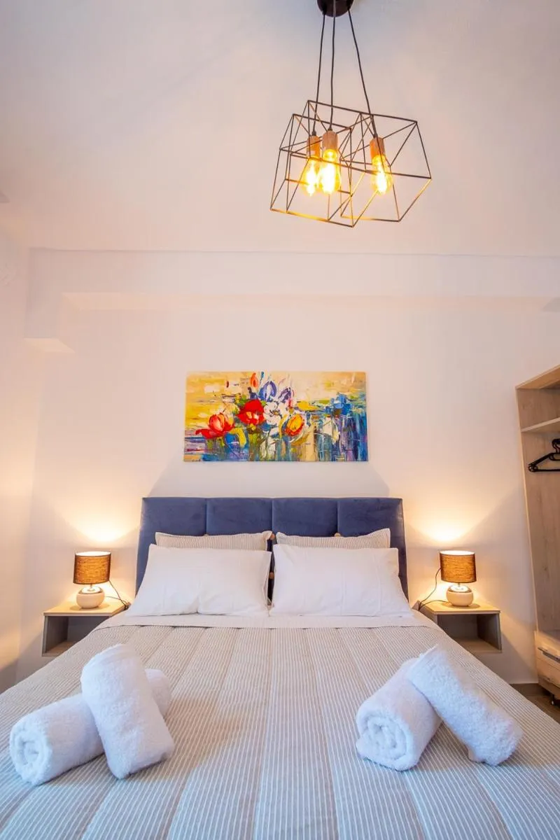 Bed in Serenity Luxe Suites