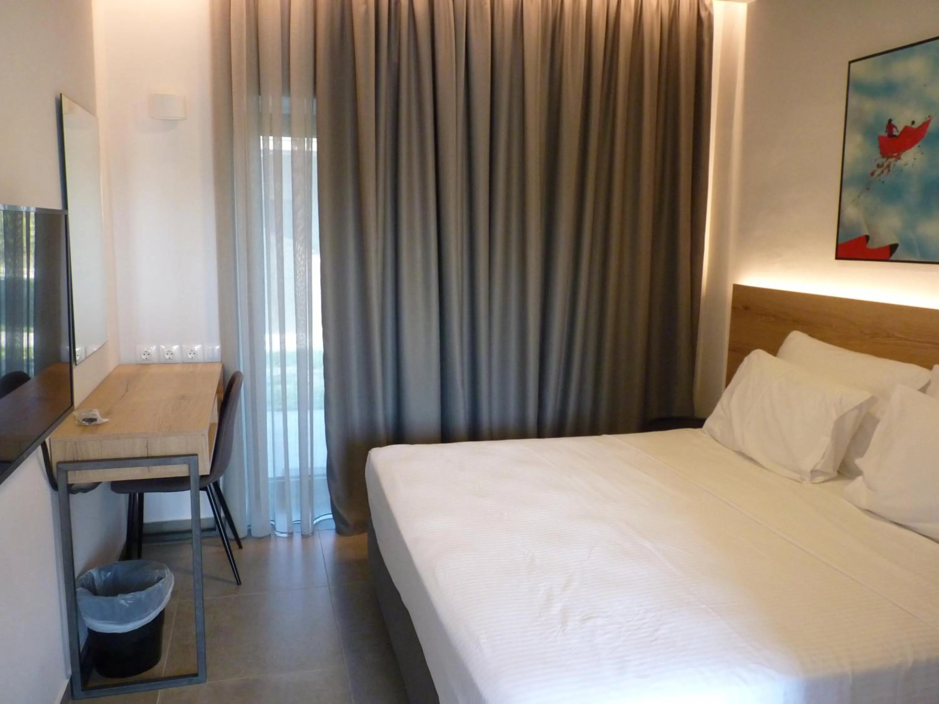 Bed in Comfort Suites & Rooms