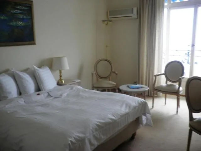 Bed in Hôtel du Grand Lac Excelsior