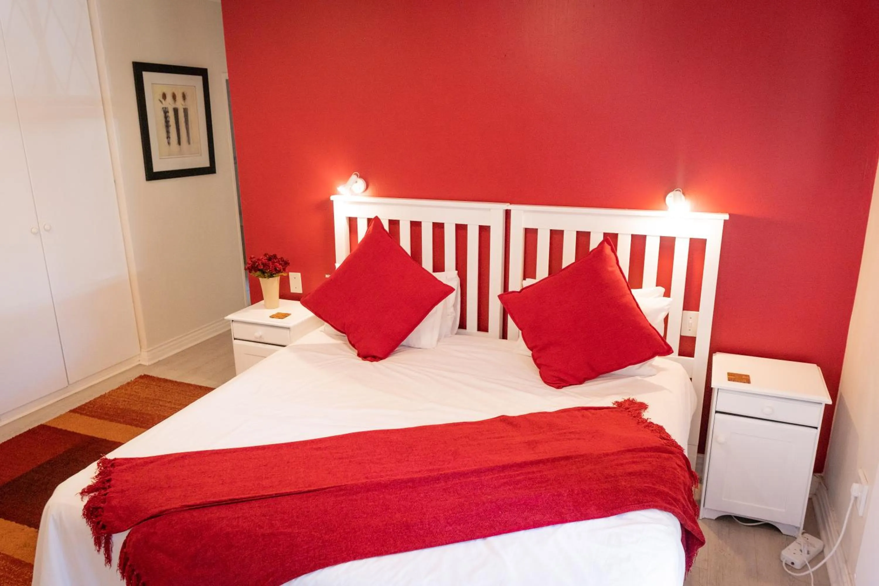 Bed in Rustic Manor Guest House