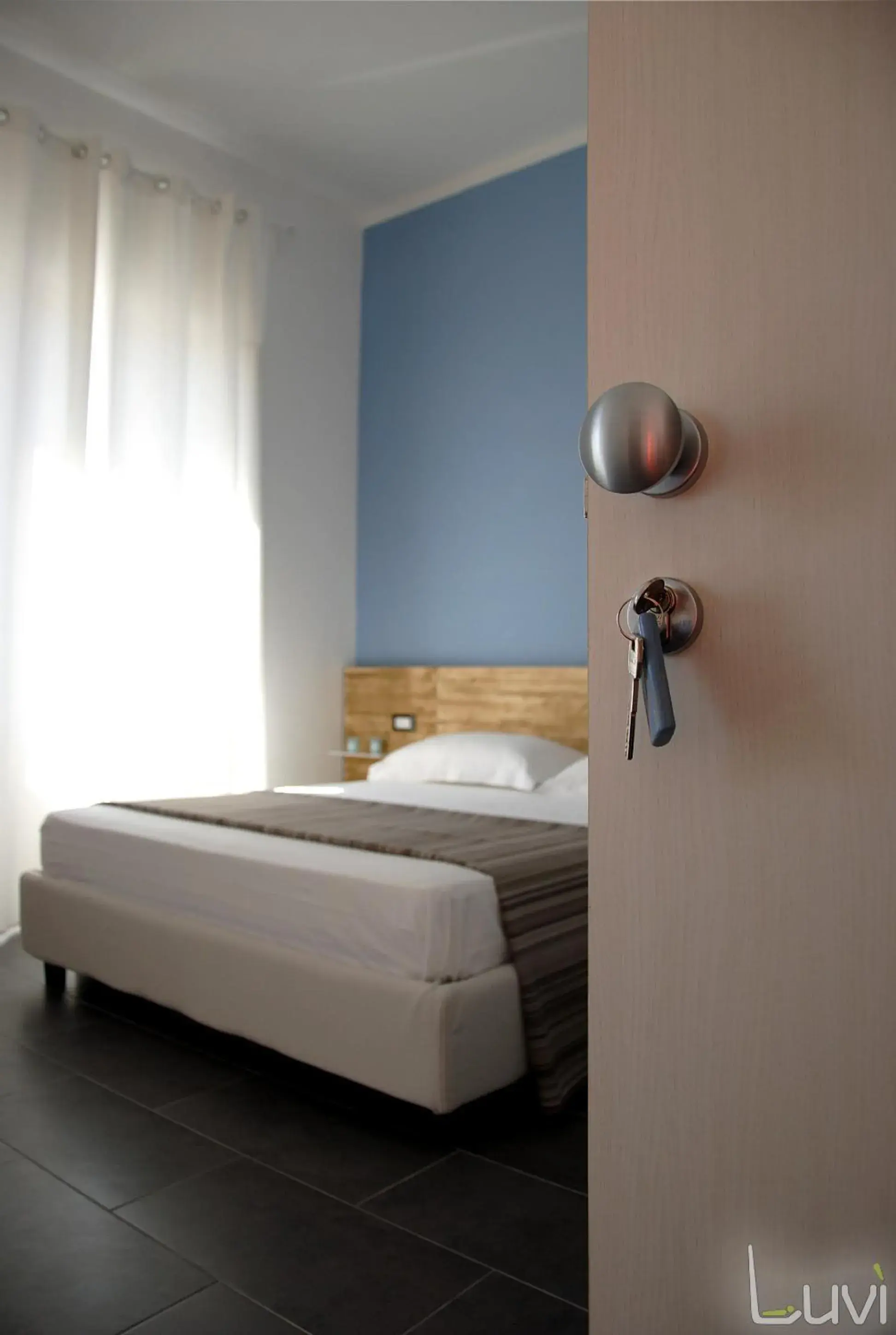 Triple Room in B&B Luvì Triple Room in B&B Luvì
