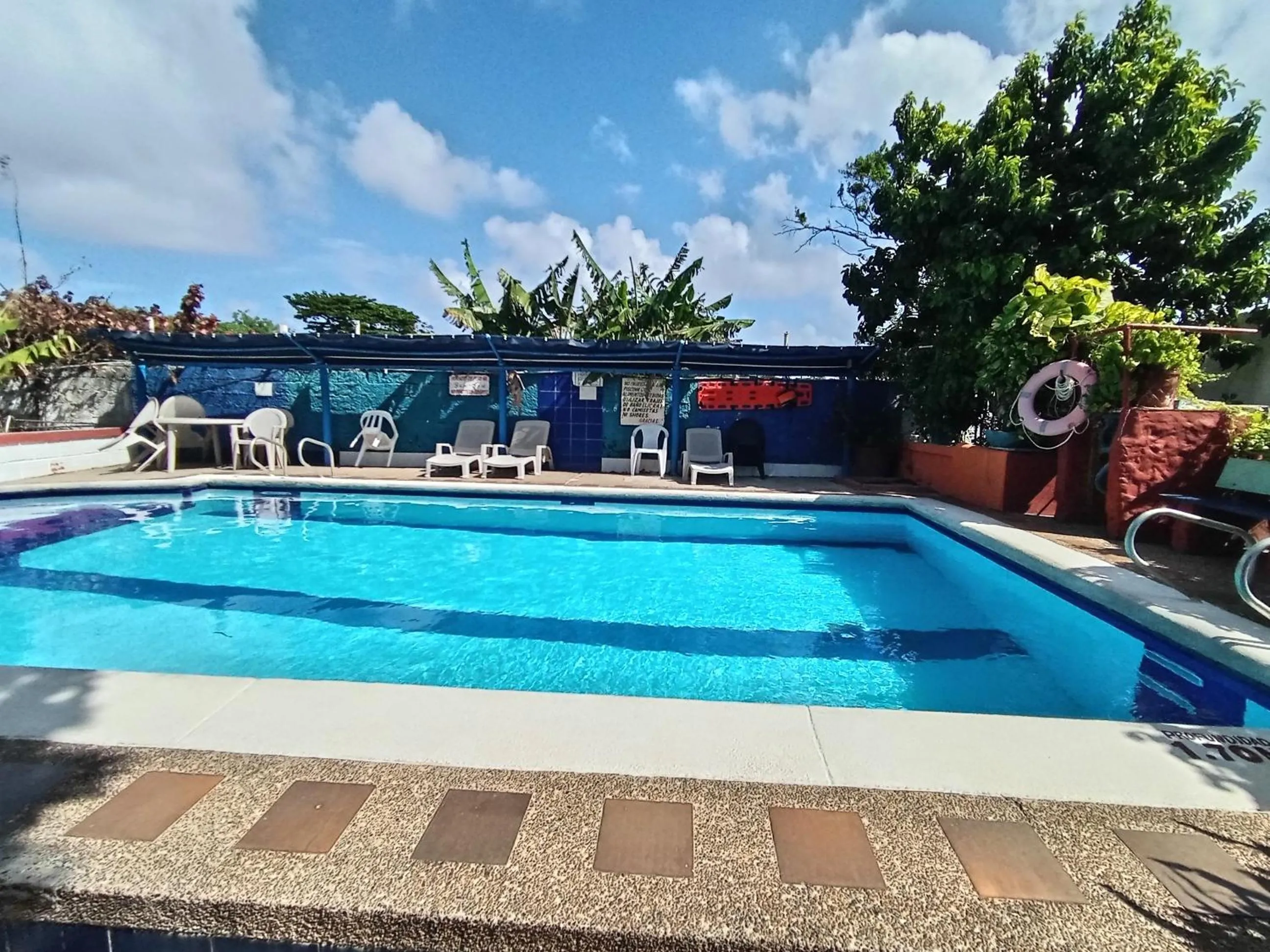 Swimming pool in Hospedaje Turistico Angula Place