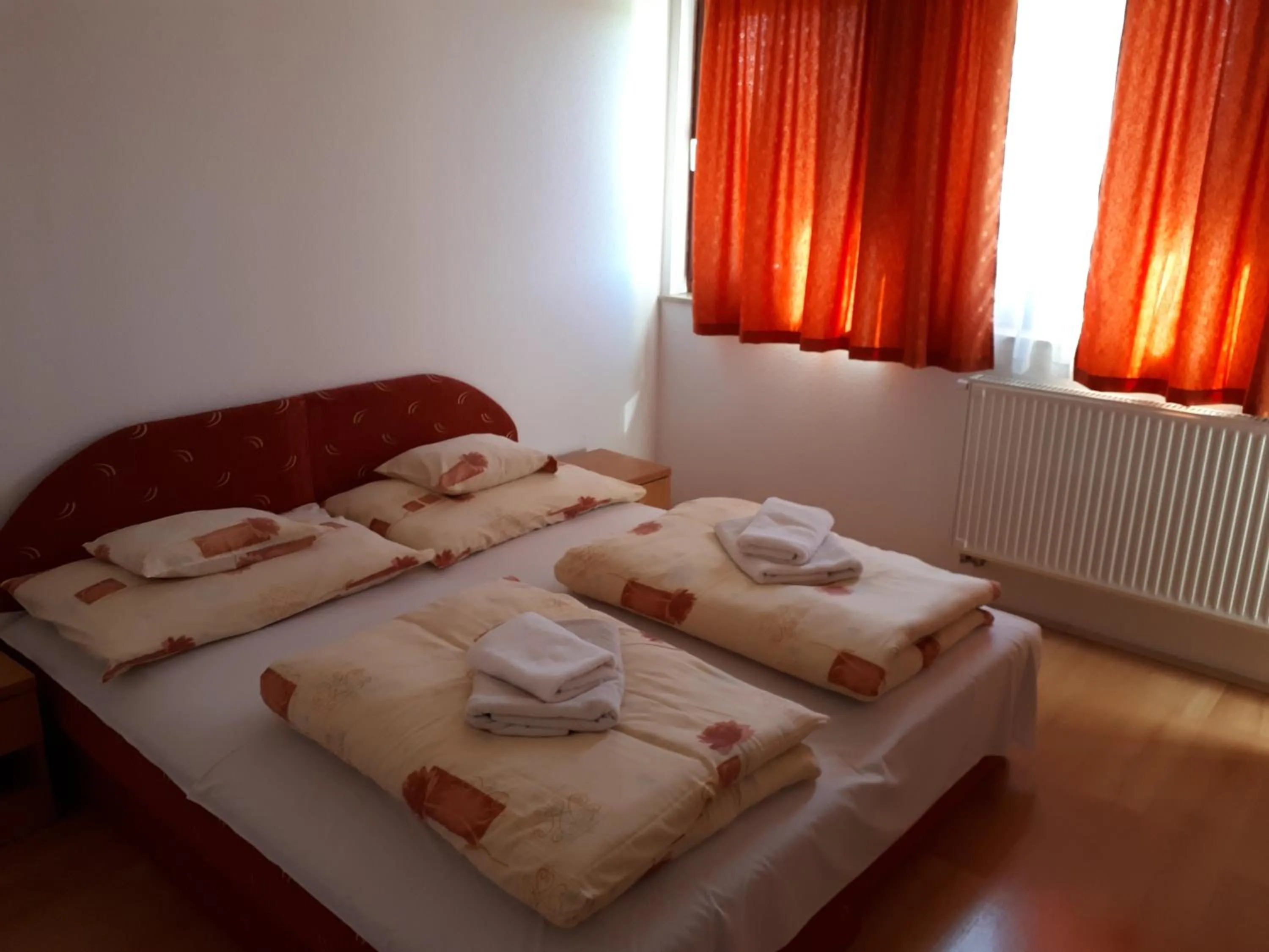 Bed in Bianka Apartmanház