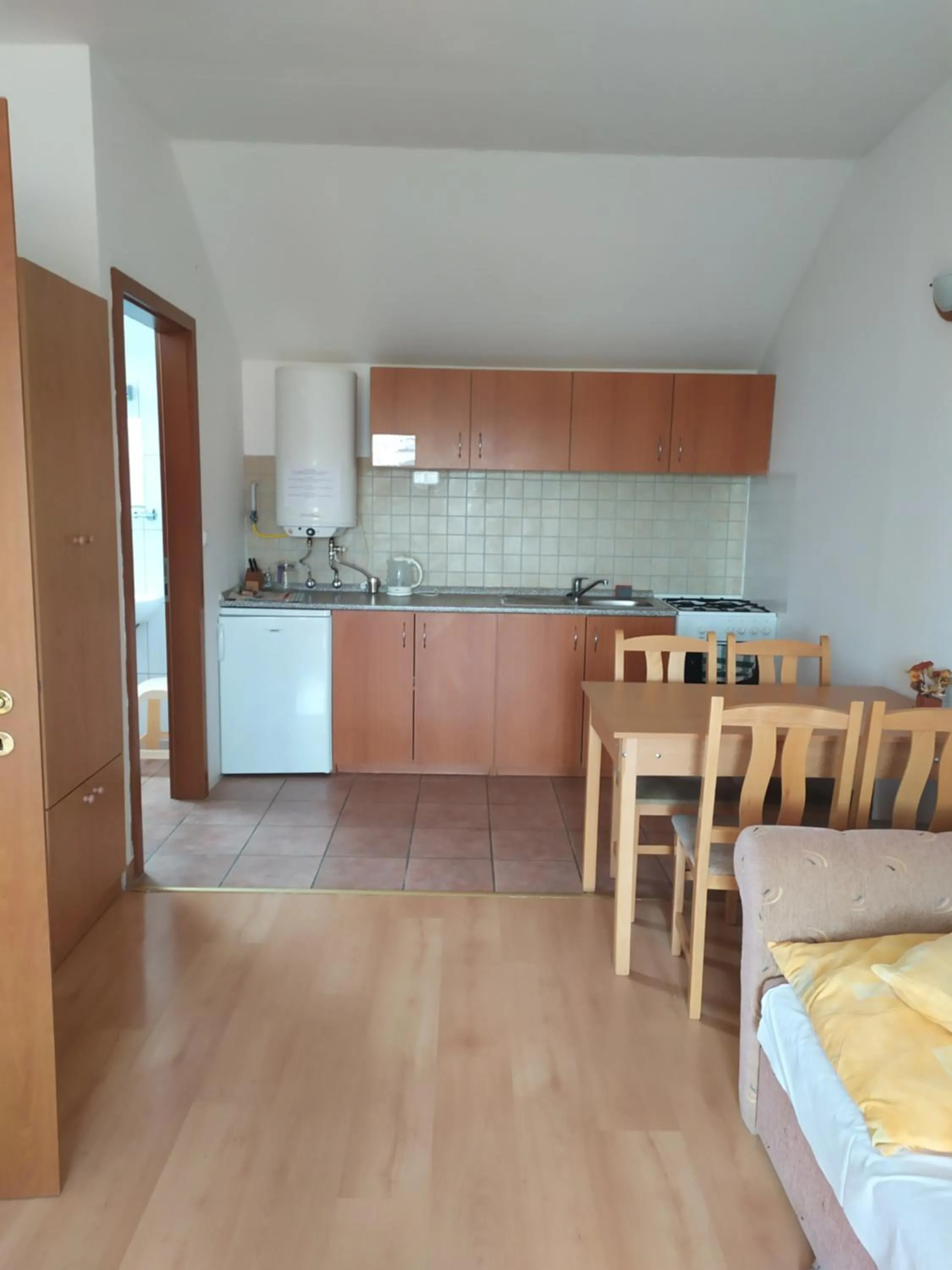 Kitchen or kitchenette in Bianka Apartmanház