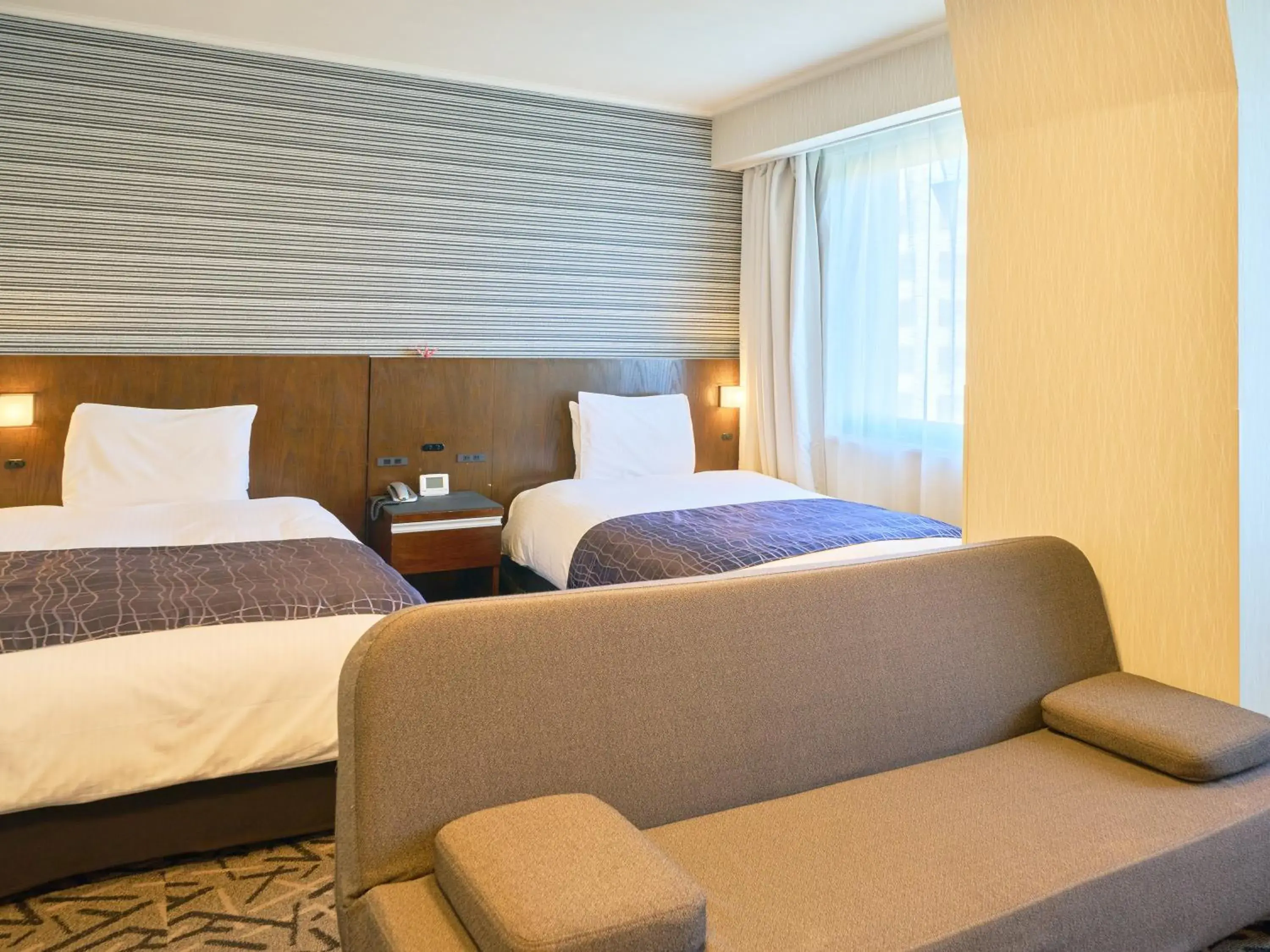 Bed in APA Hotel Matsuyamajo Nishi Bed in APA Hotel Matsuyamajo Nishi