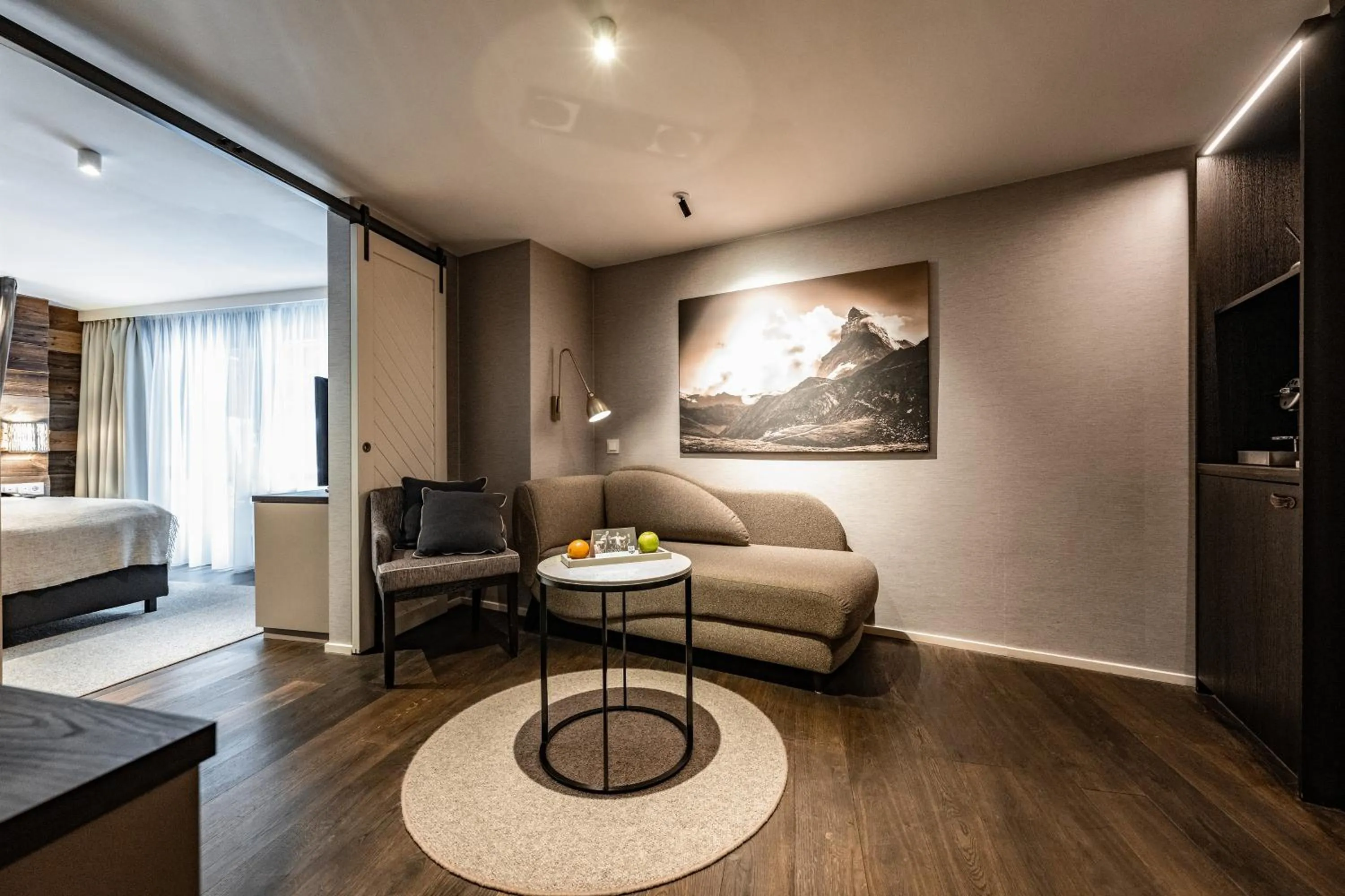 Living room, Bed in Wellness Hotel Alpenhof