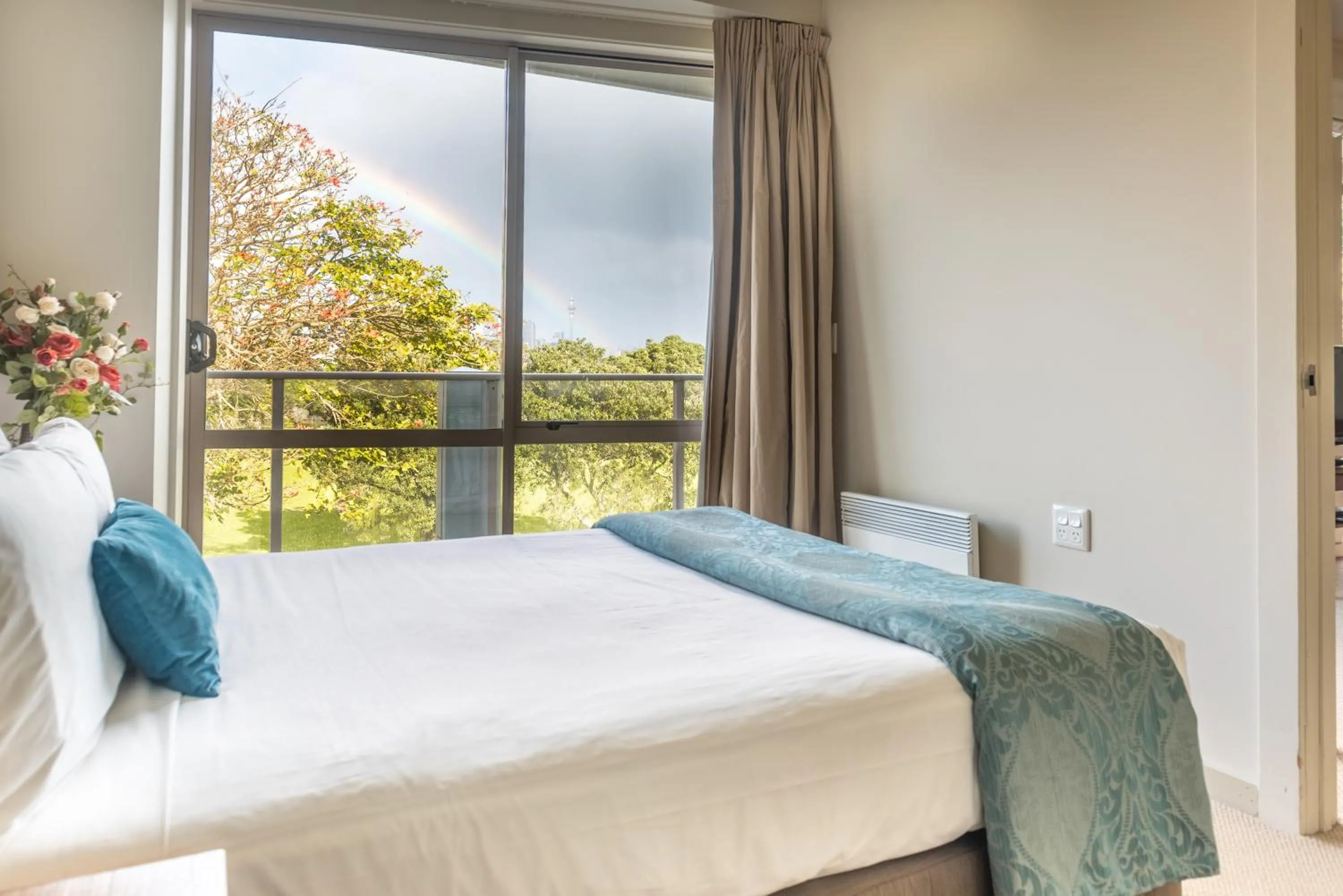 Balcony/Terrace, Bed in Ocean Breeze Hotel