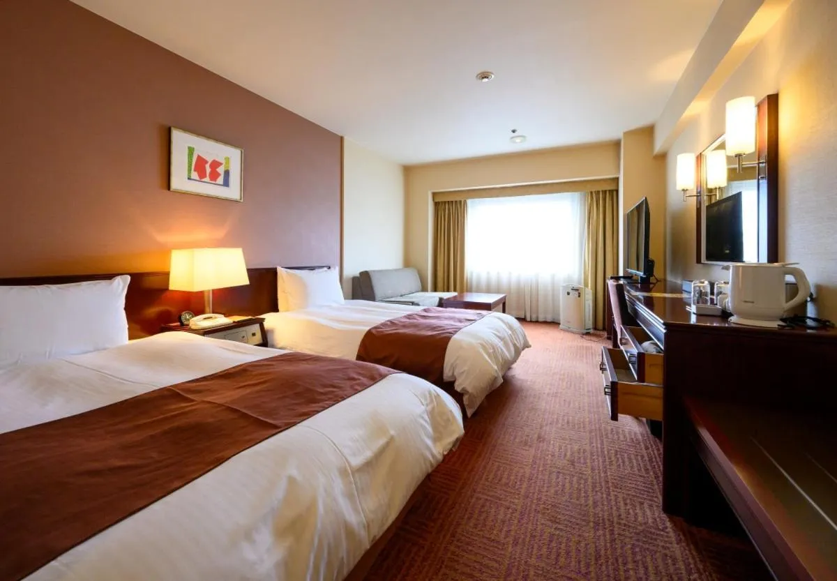 Bed in Fukuyama New Castle Hotel