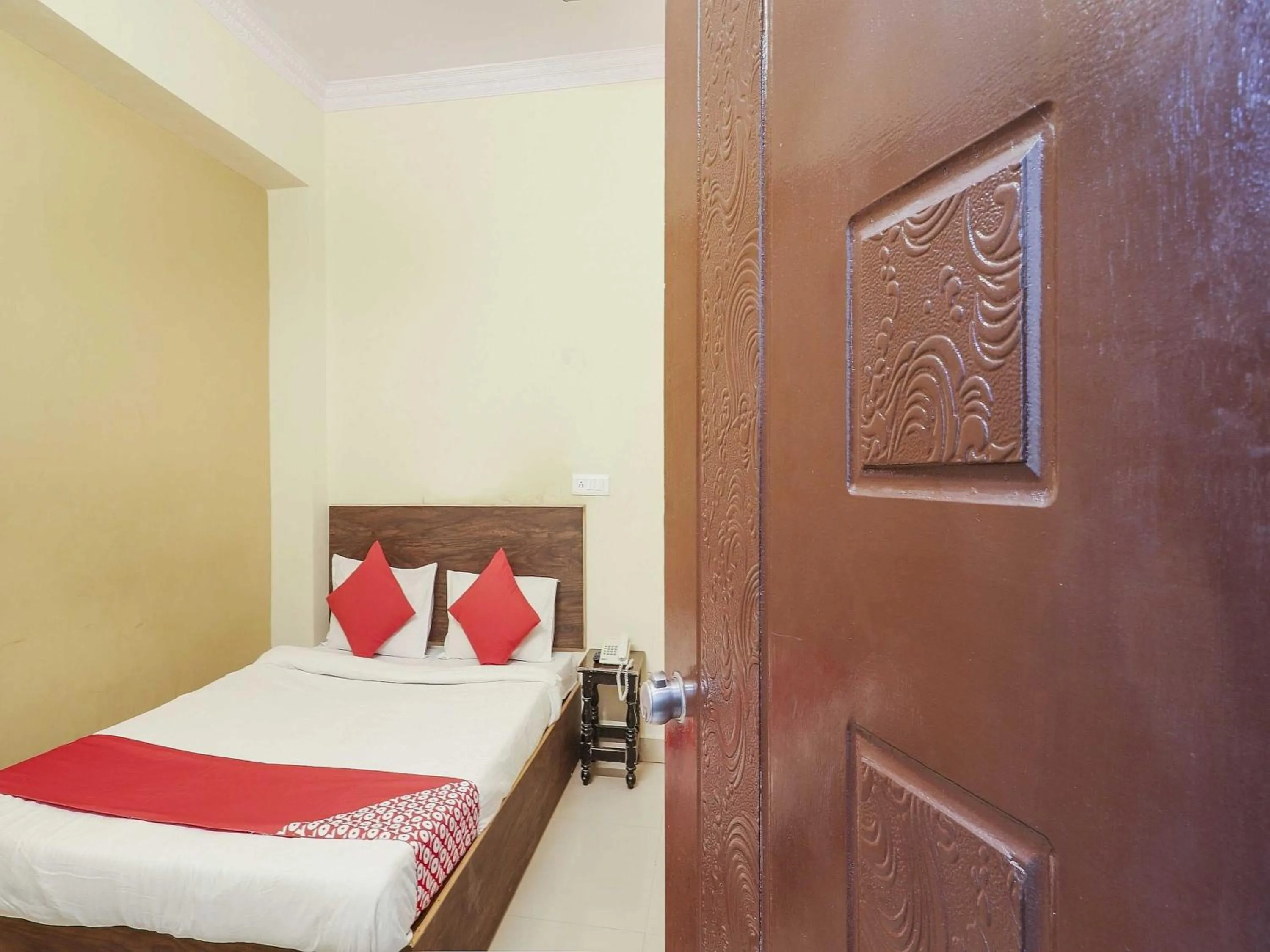 Bedroom in Hotel O Sai Pariwar