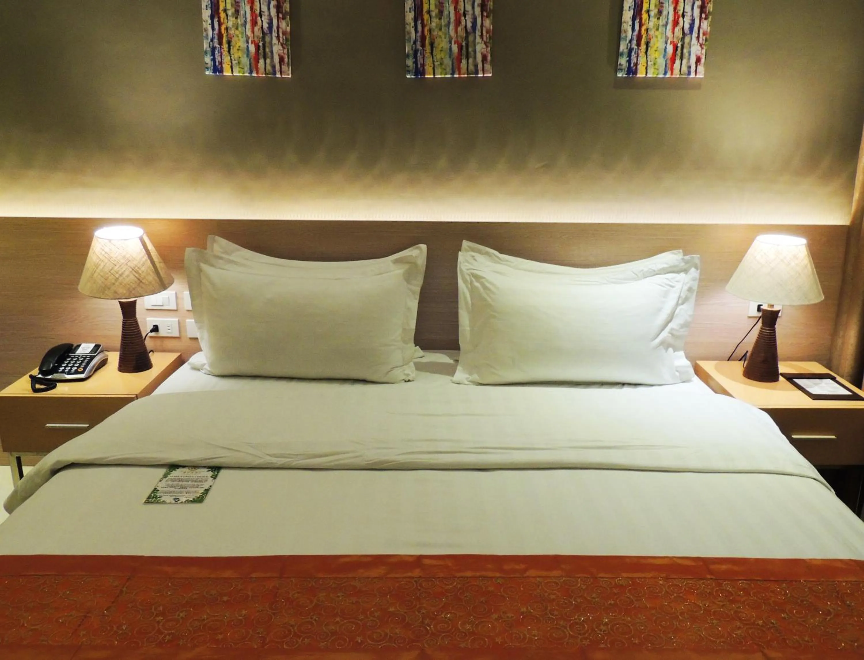 Bed in Dela Chambre Hotel