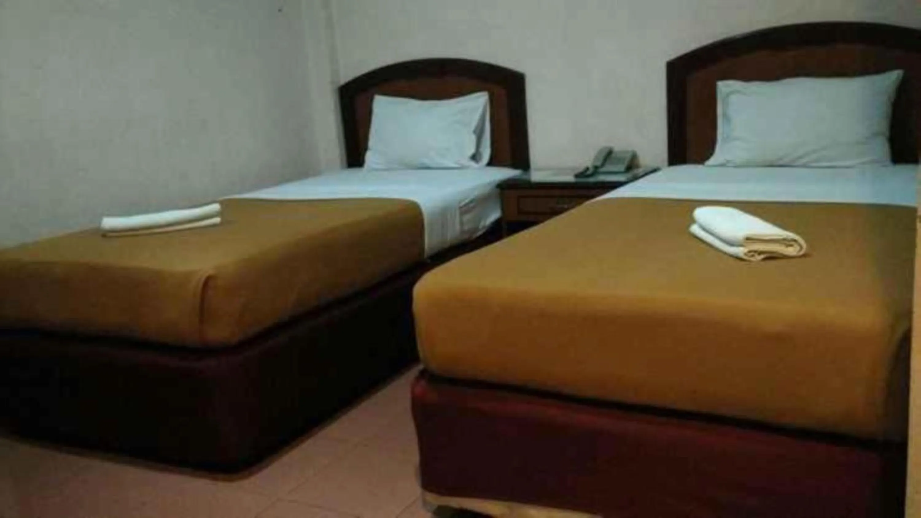 Bedroom, Bed in Hotel Parewisata