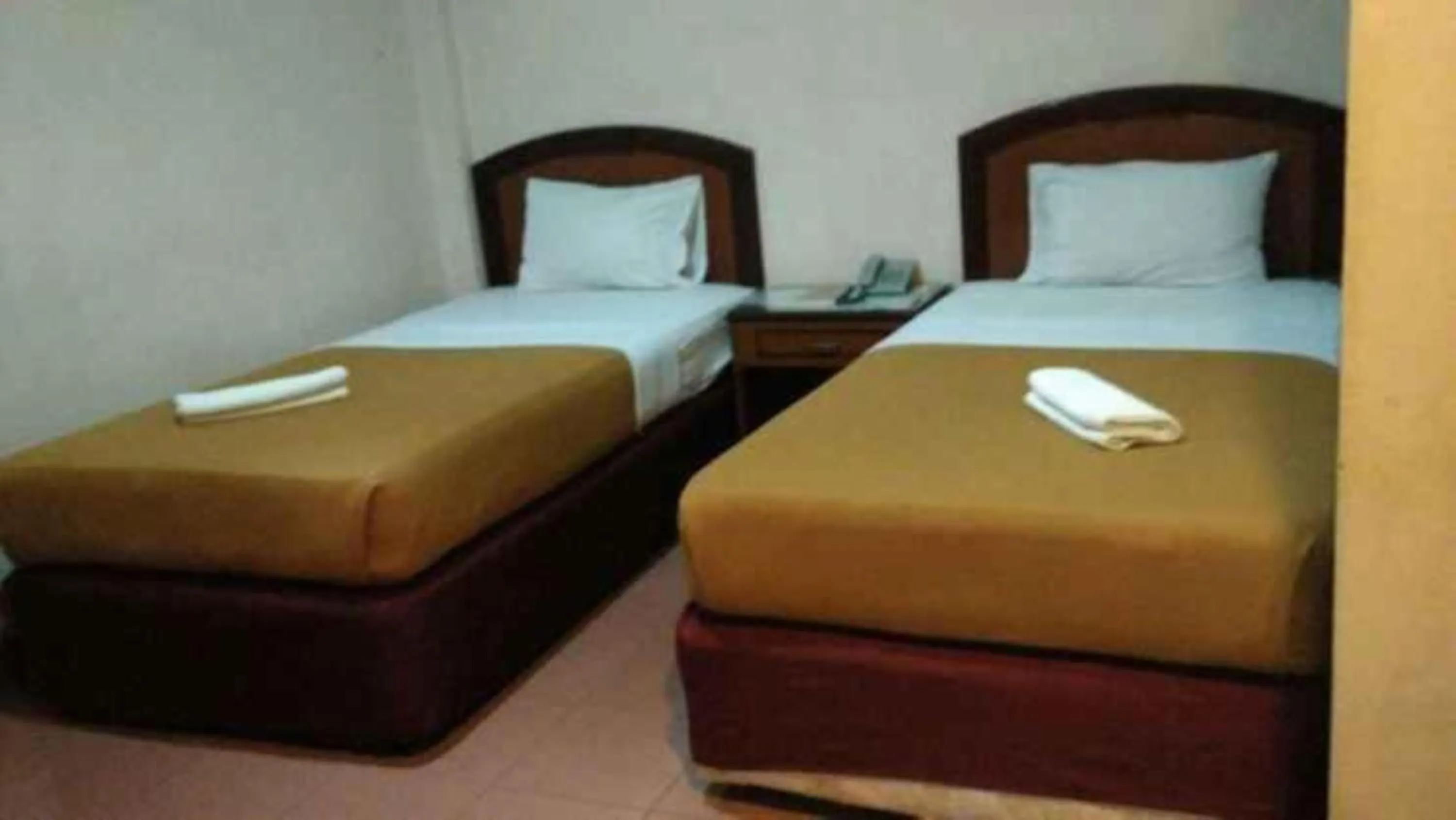 Bedroom, Bed in Hotel Parewisata