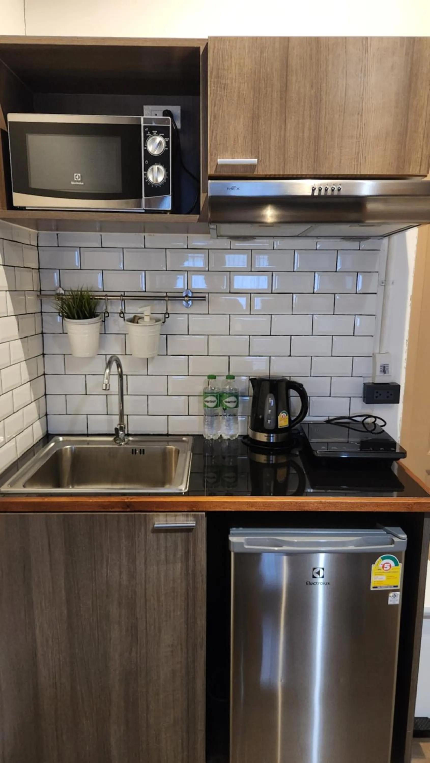 Kitchen or kitchenette in Krung Boutique Hotel