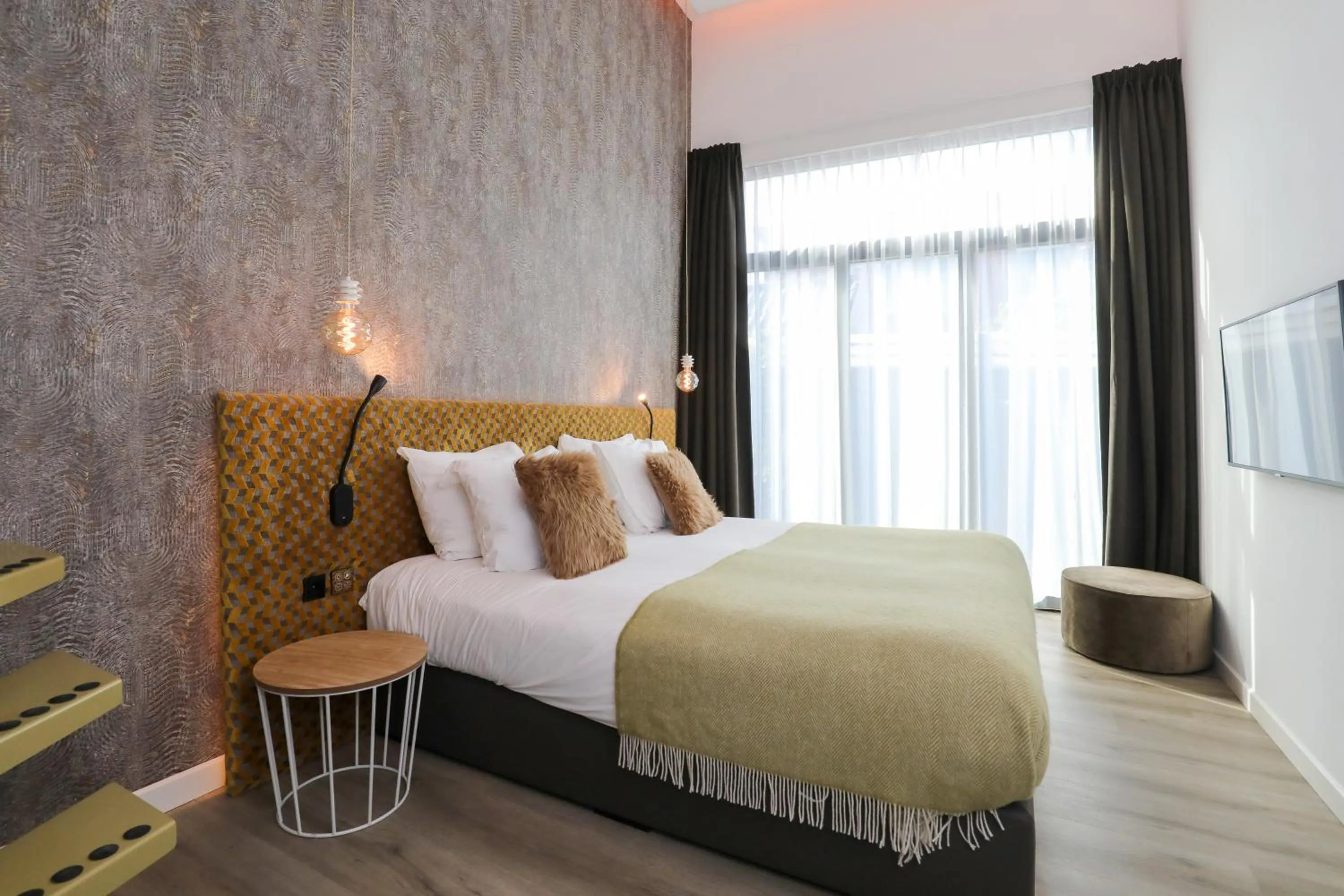 Bed in Valerius Boutique Hotel