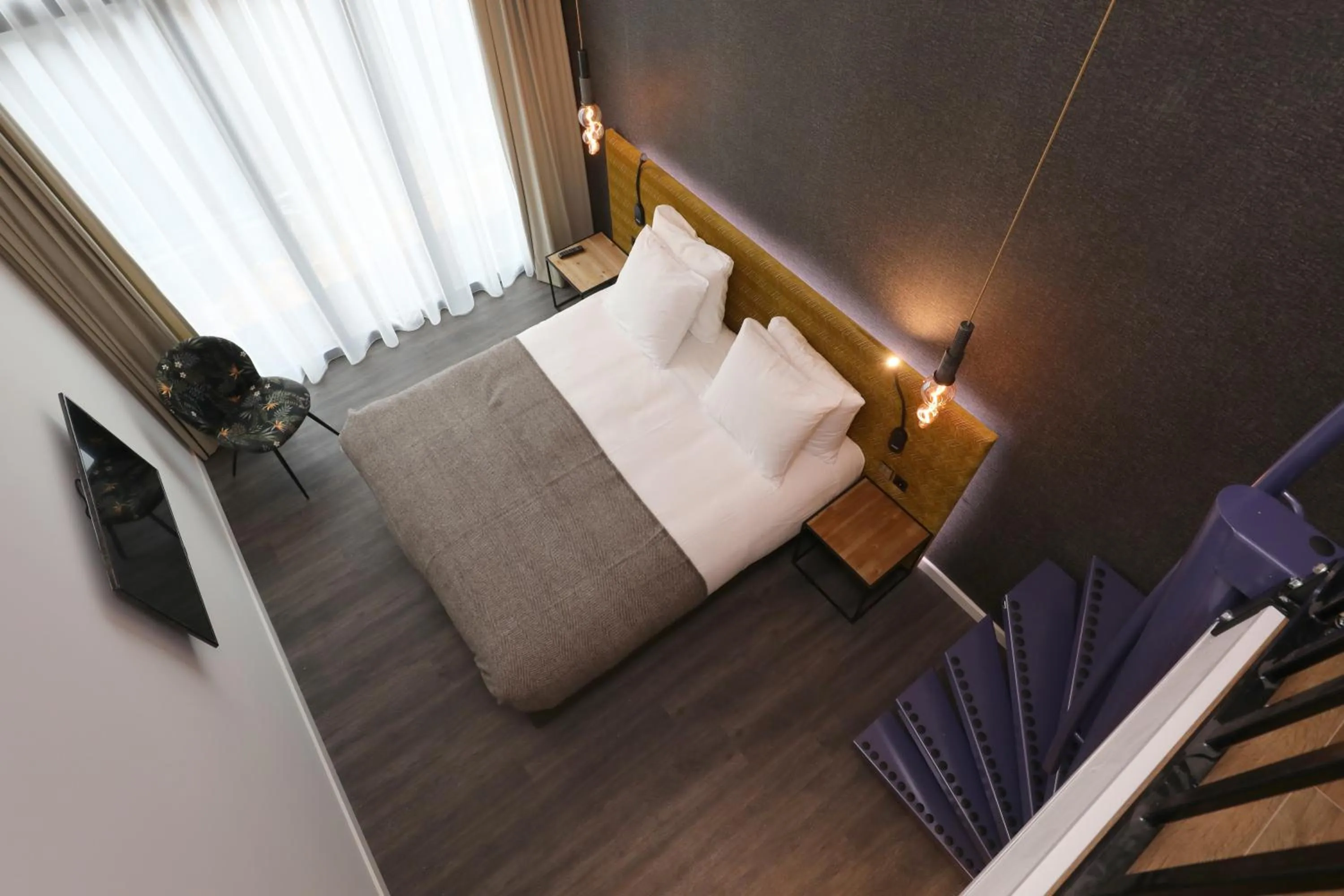 Bed in Valerius Boutique Hotel