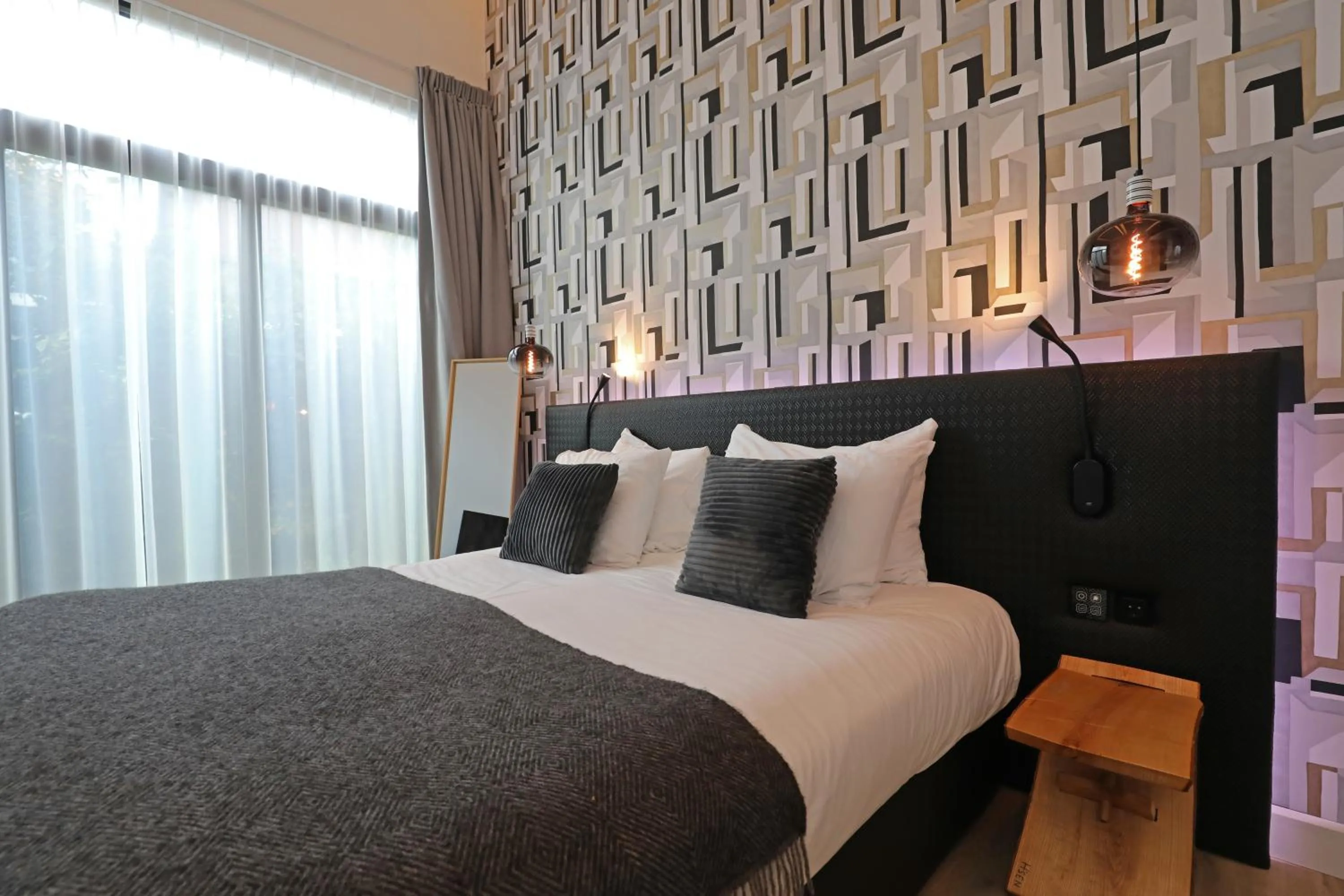 Bed in Valerius Boutique Hotel