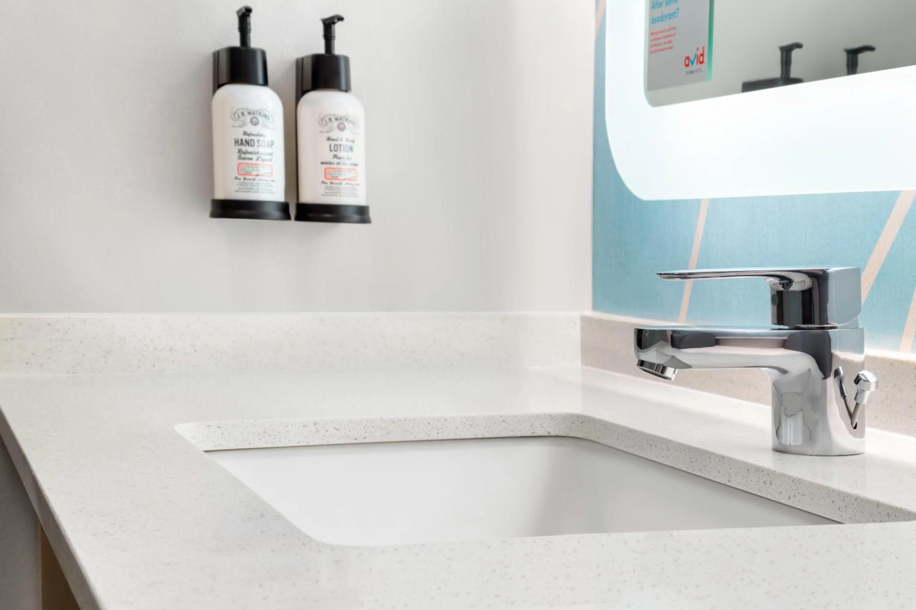 Bathroom in Avid Hotel Cedar Rapids South - Arpt Area by IHG