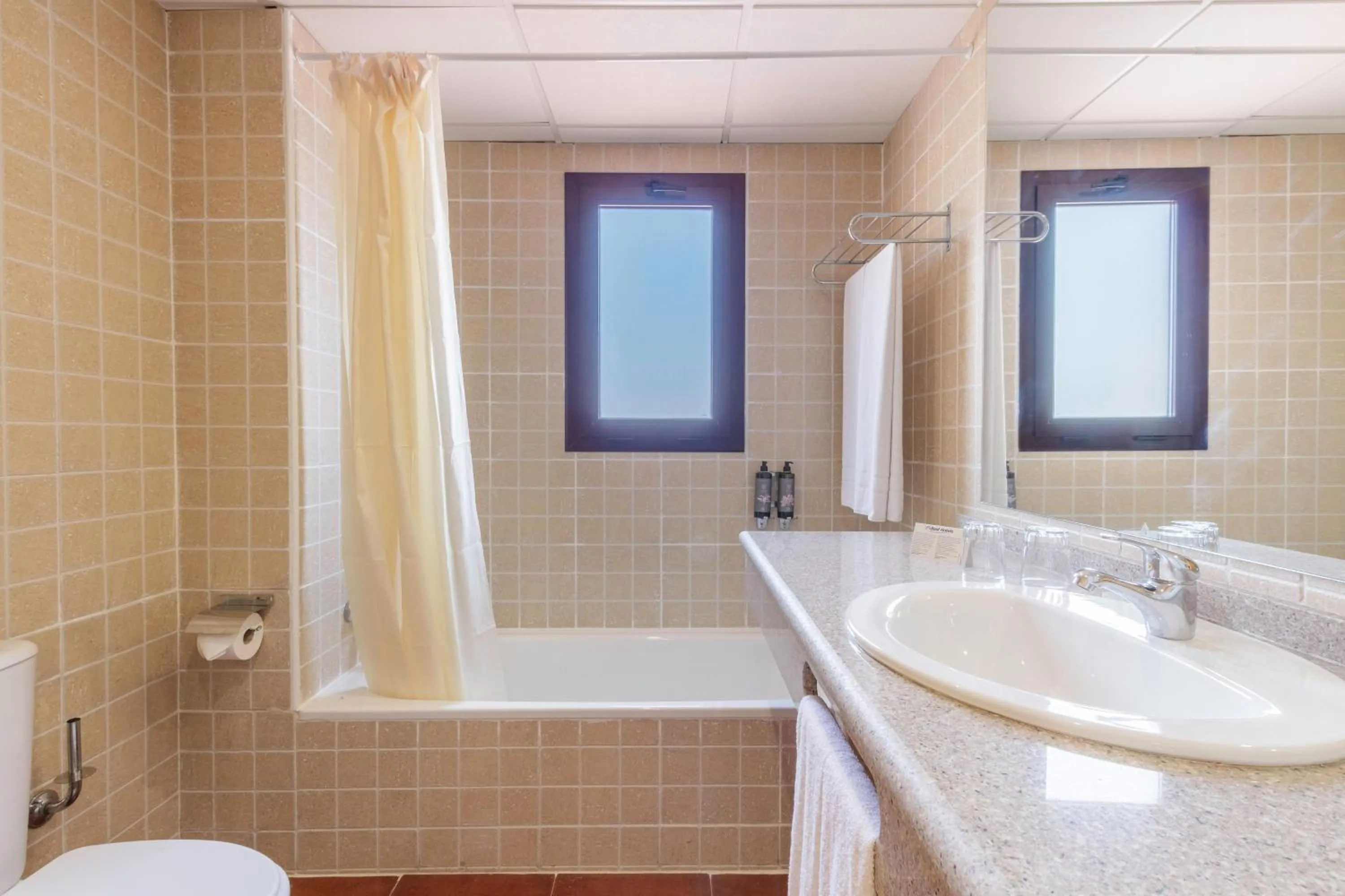 Bathroom in Apartamentos Best Alcazar