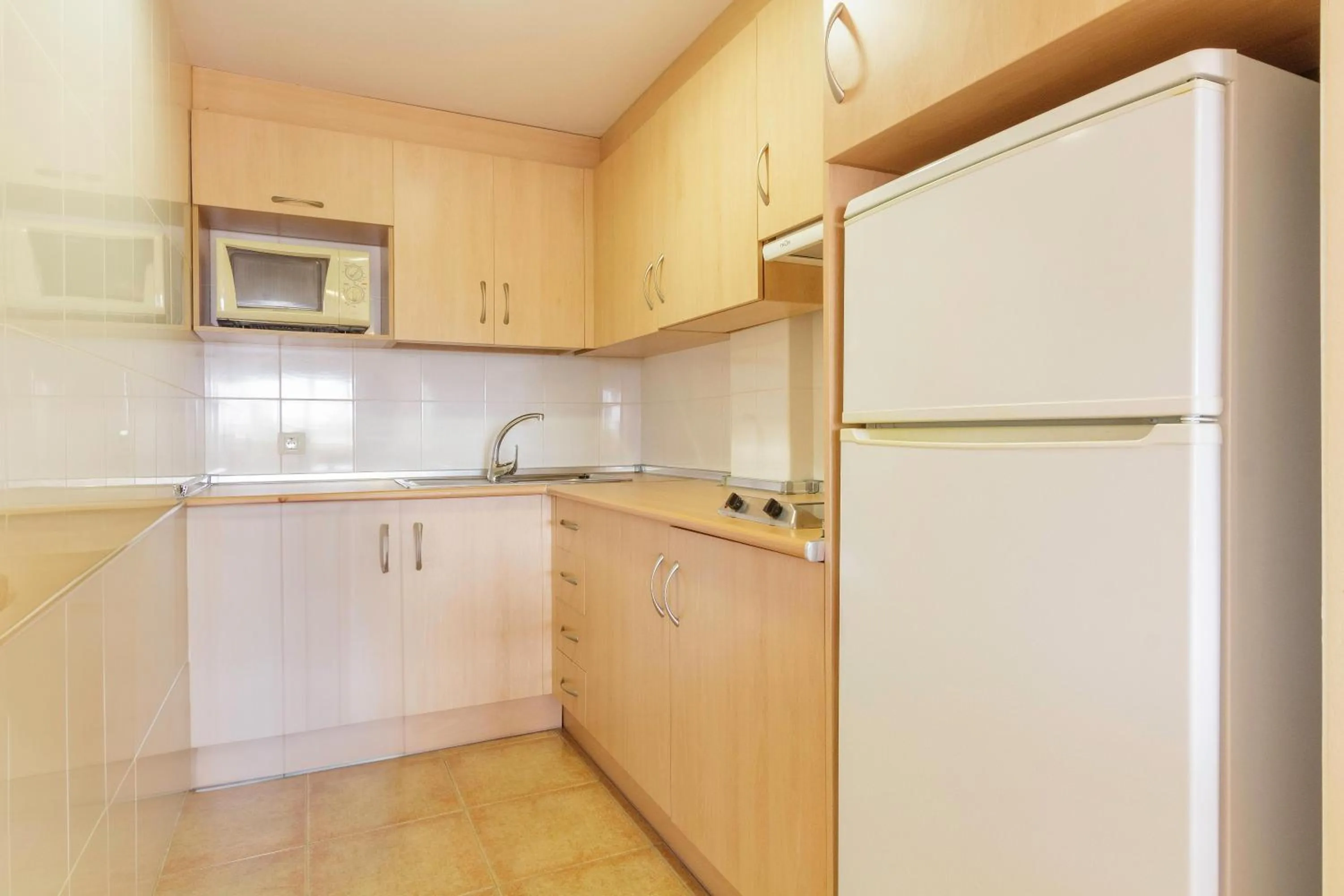 Kitchen or kitchenette in Apartamentos Best Alcazar
