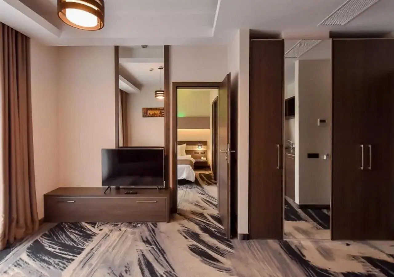 Living room, Bed in Hotel Scapino Living room, Bed in Hotel Scapino