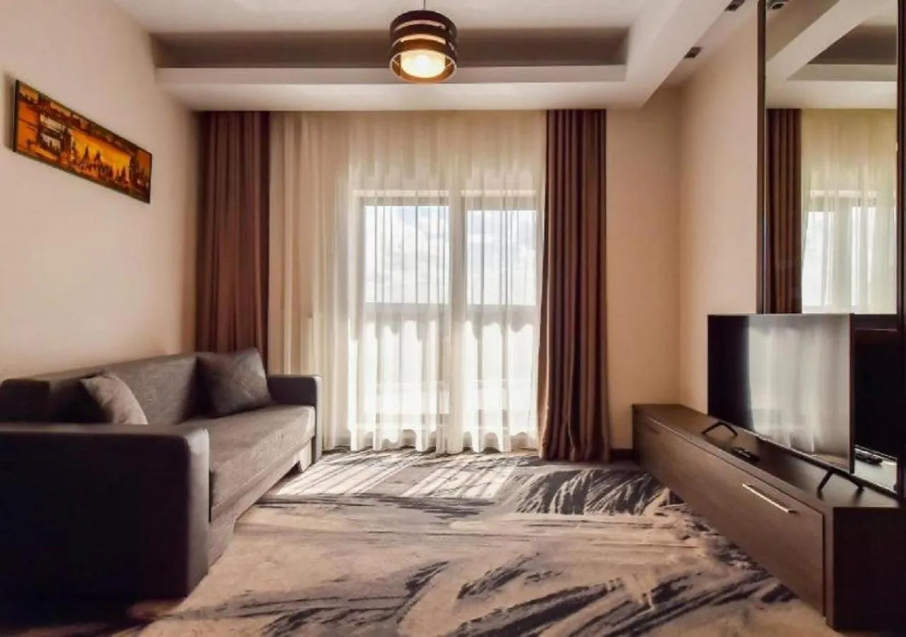 Living room, Bed in Hotel Scapino