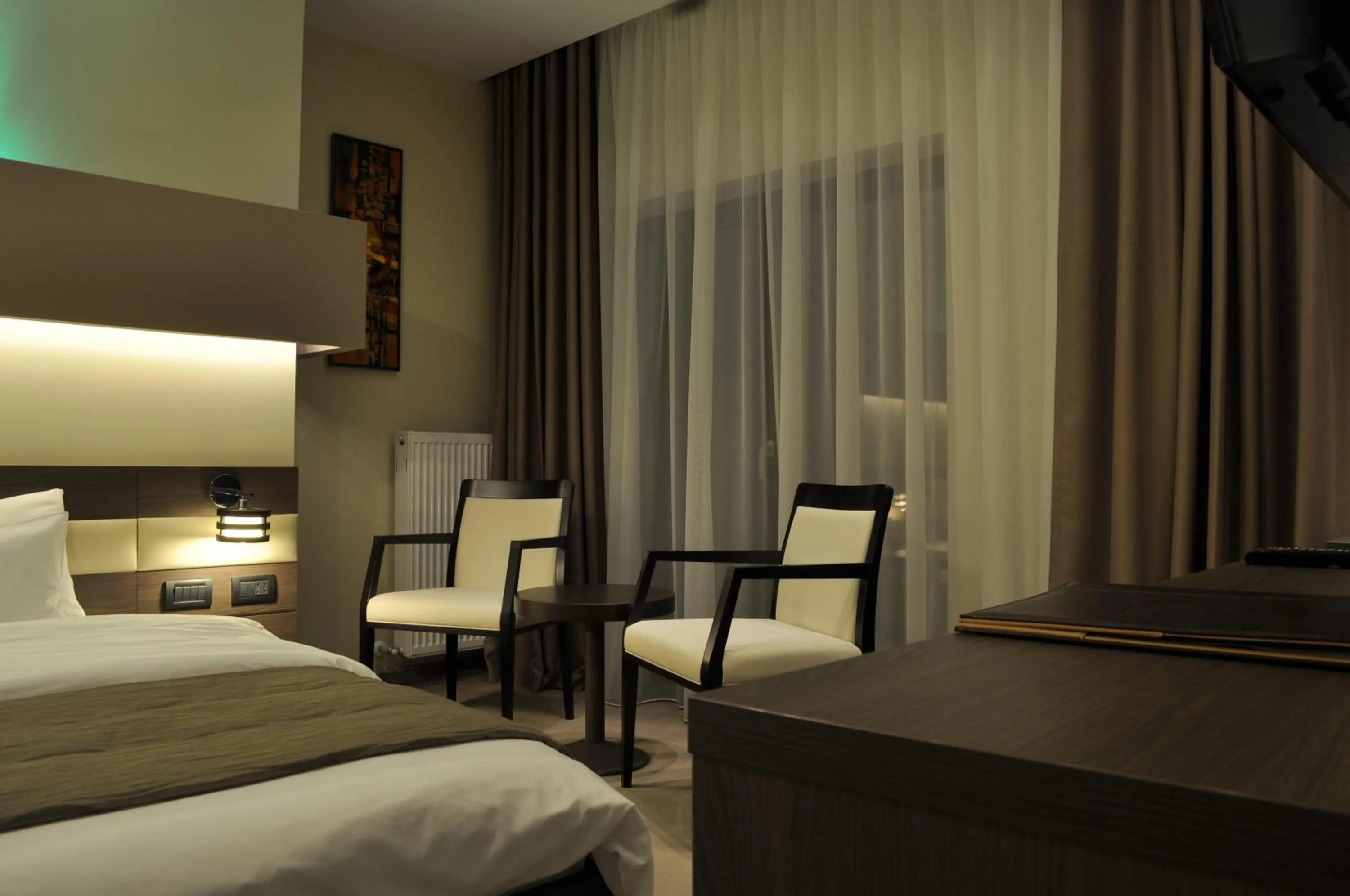 Bed in Hotel Scapino