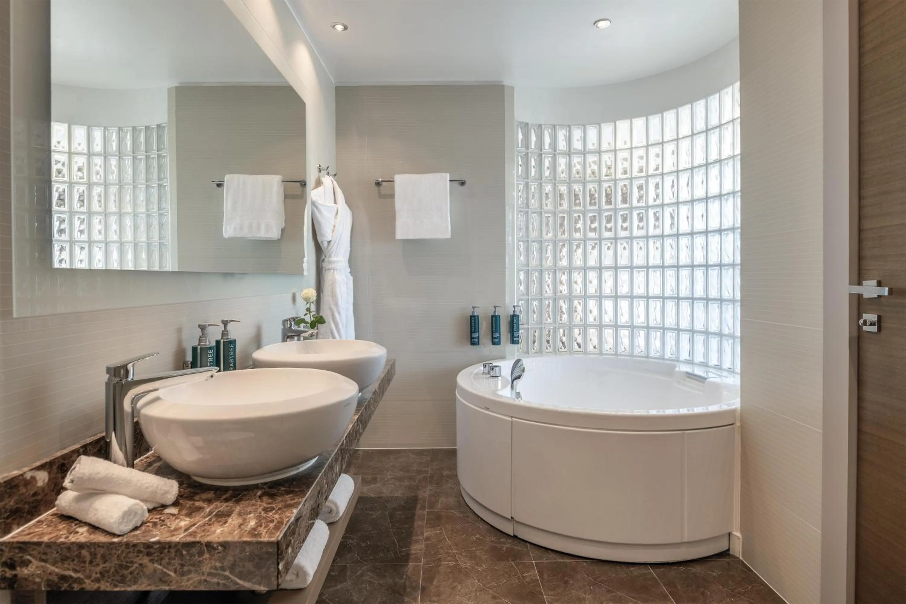 Bathroom in Hilton Geneva Hotel and Conference Centre