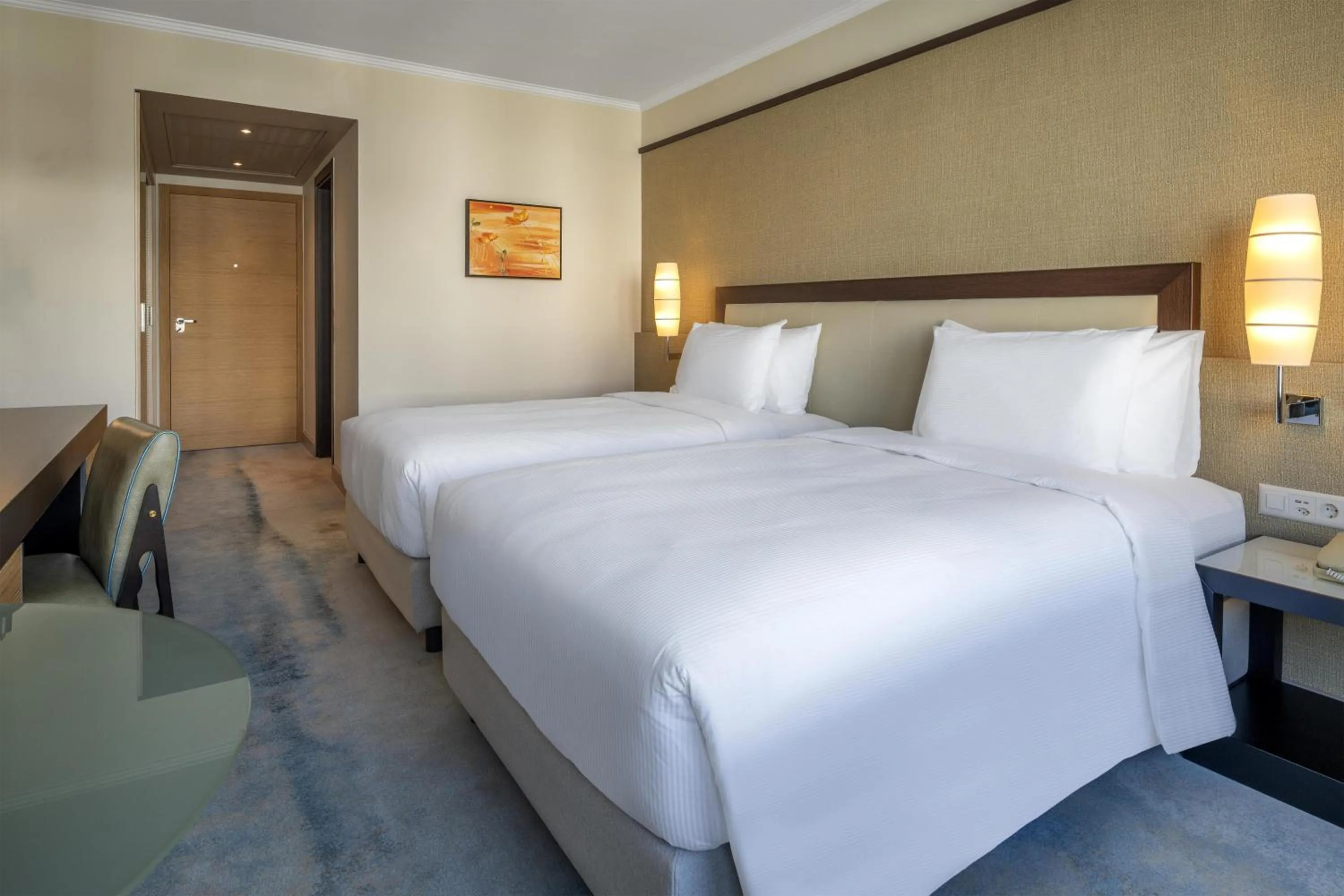 Bed in Hilton Geneva Hotel and Conference Centre