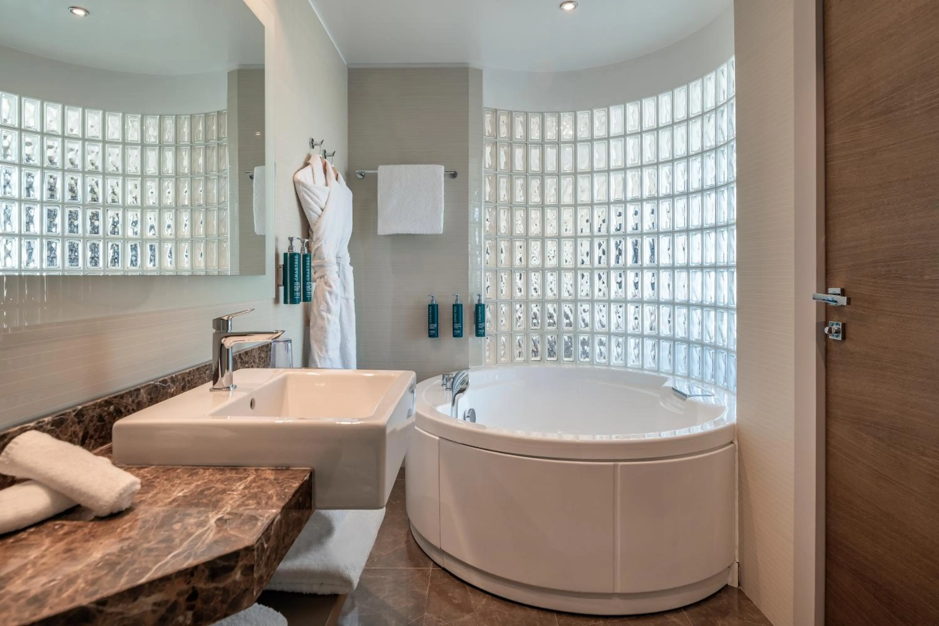 Bathroom in Hilton Geneva Hotel and Conference Centre