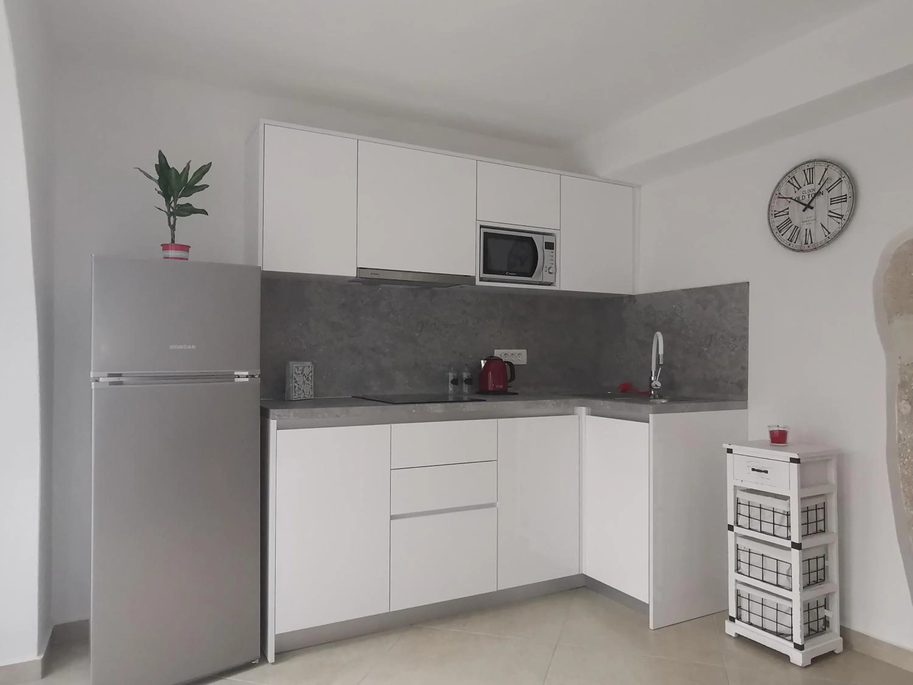 Kitchen or kitchenette in Apartman Otto