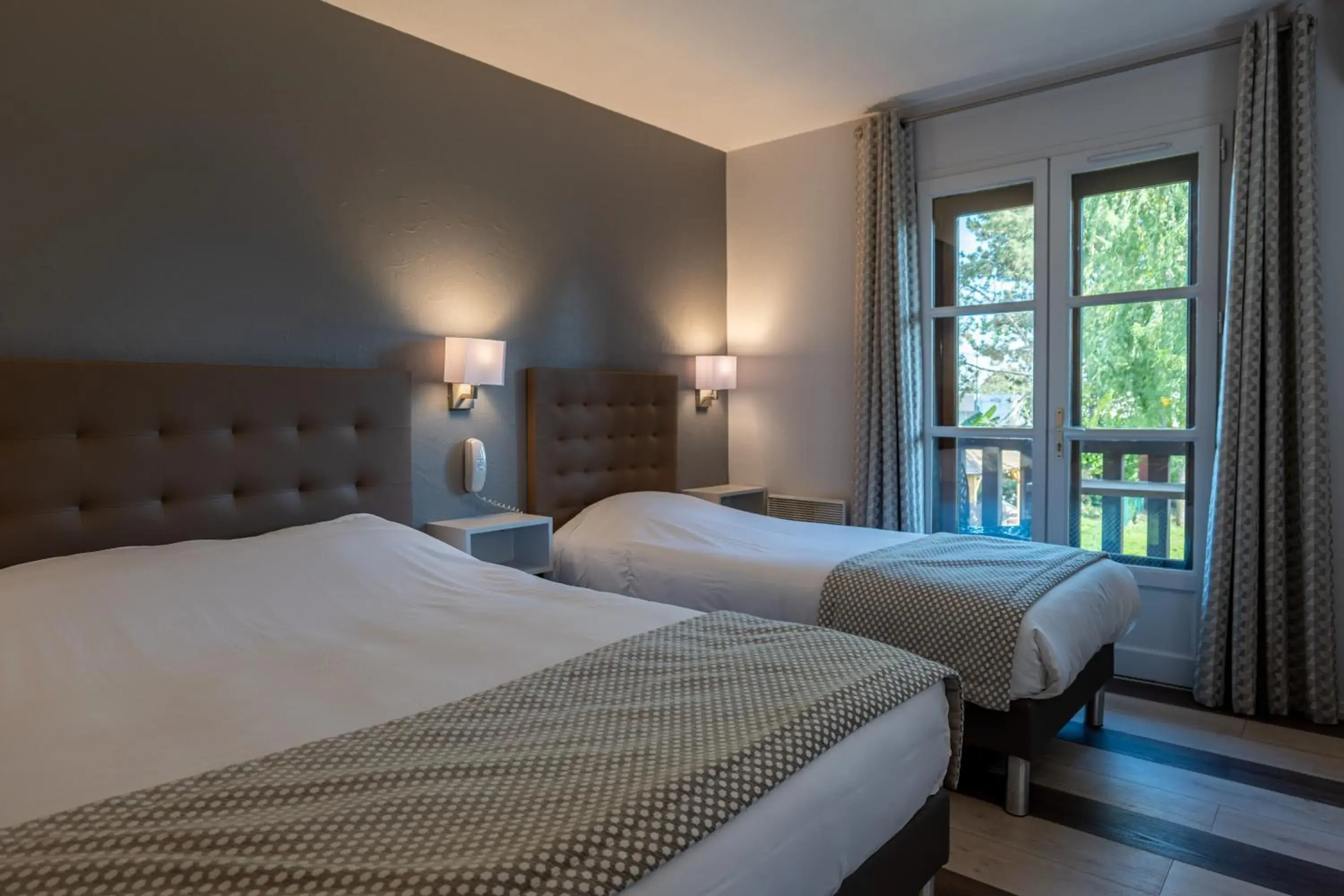 First Floor Family Room with Balcony in Hotel Village Motel First Floor Family Room with Balcony in Hotel Village Motel