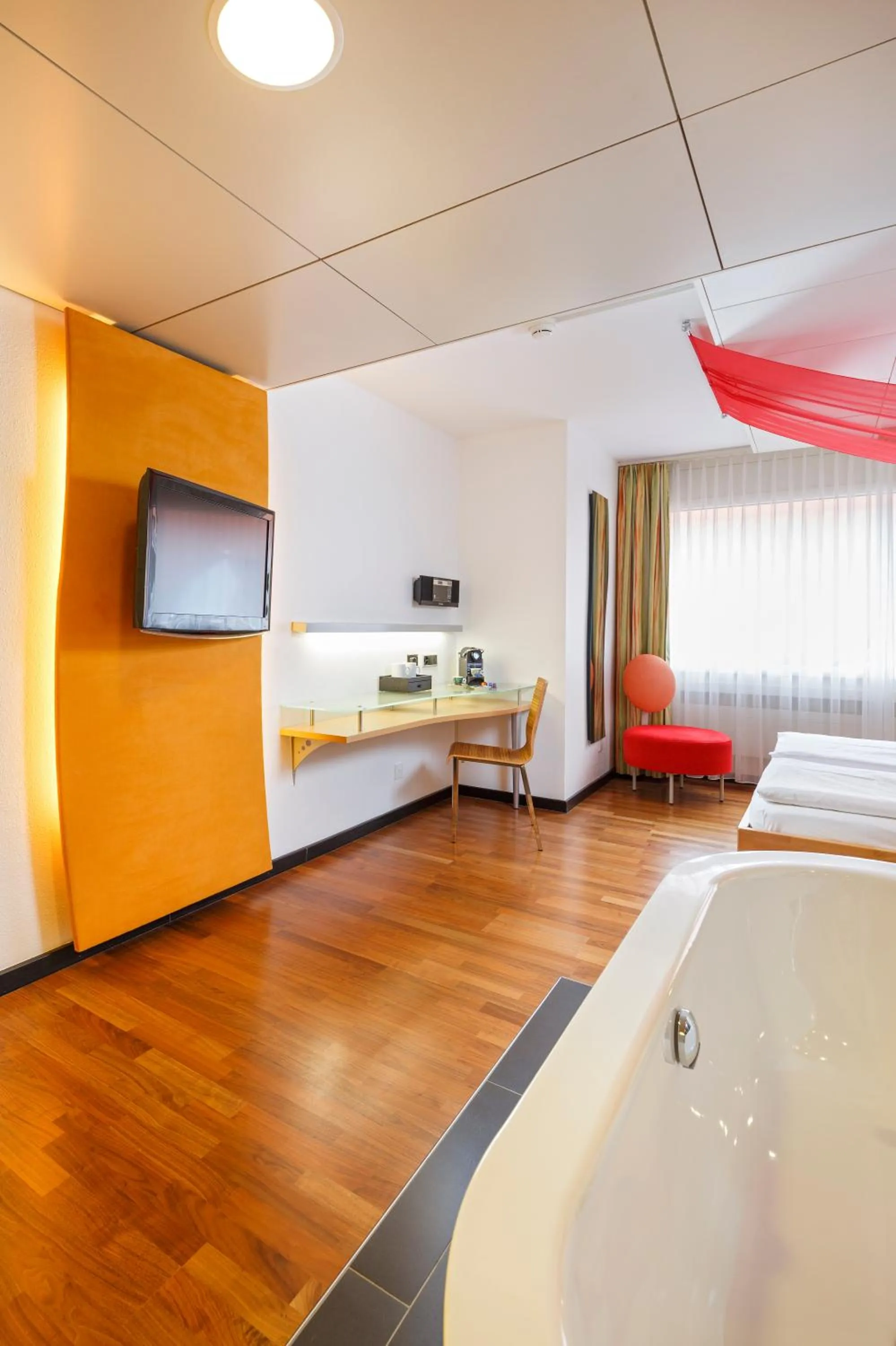 Photo of the whole room, Bed in Ramada by Wyndham Baden Hotel du Parc