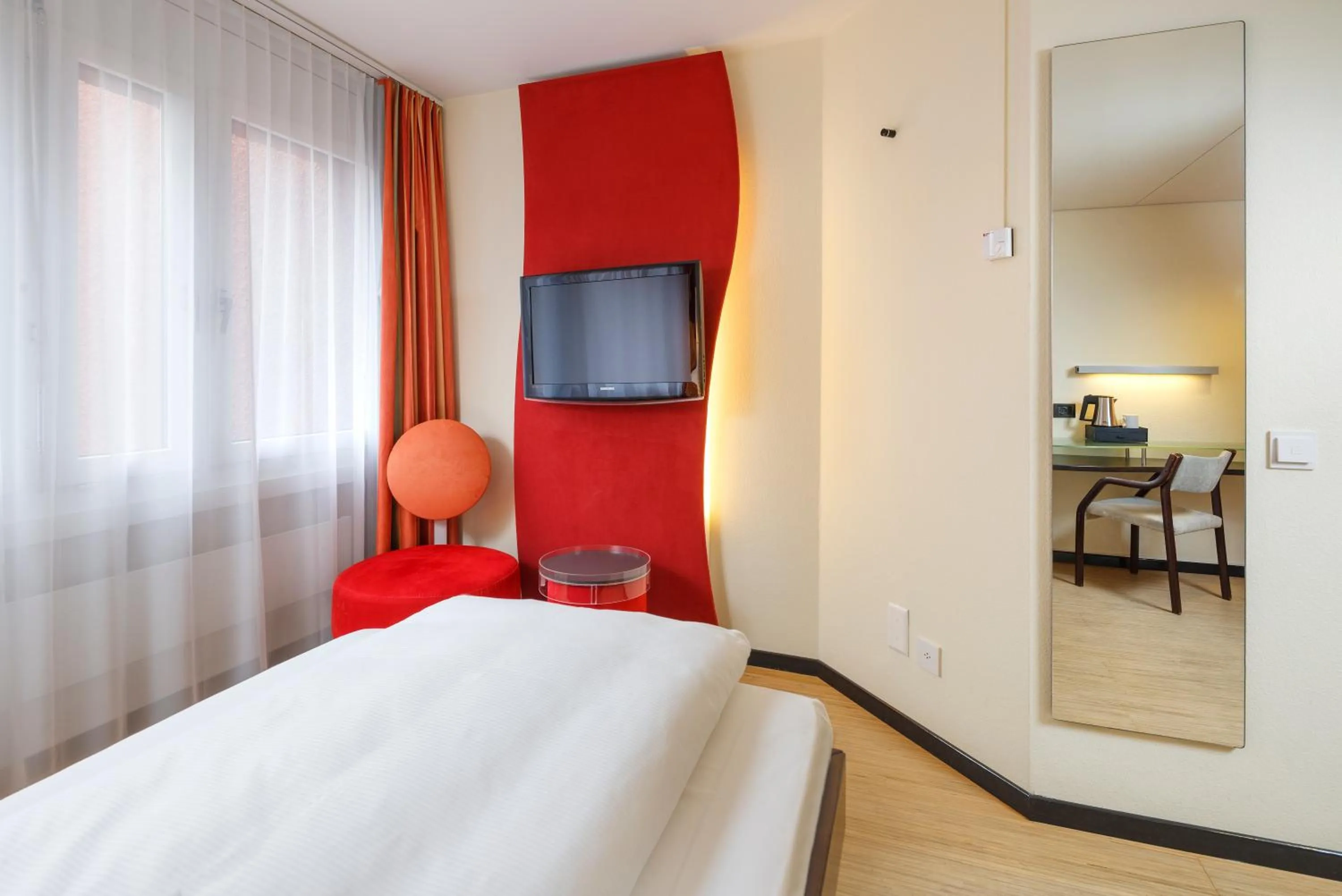 Photo of the whole room, Bed in Ramada by Wyndham Baden Hotel du Parc